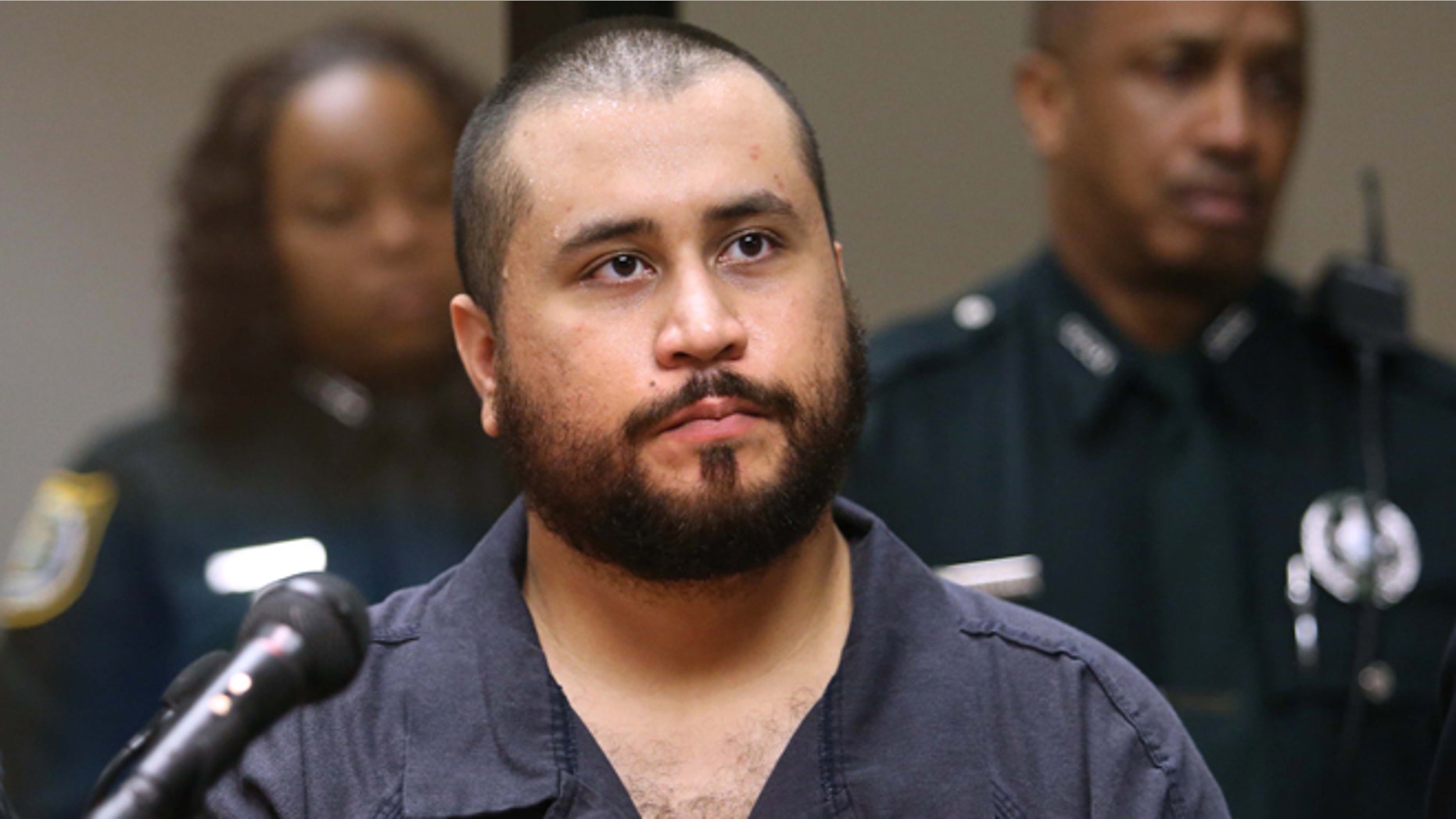 FILE - In this Tuesday, Nov. 19, 2013, file photo, George Zimmerman, acquitted in the high-profile killing of unarmed black teenager Trayvon Martin, listens in court, in Sanford, Fla., during his hearing on charges including aggravated assault stemming from a fight with his girlfriend. Zimmerman is asking a judge to change the terms of his bond so he can have contact with his girlfriend. Zimmerman on Monday, Dec. 9, 2013, filed an affidavit from his girlfriend that says she doesnât want him charged with aggravated assault, battery and criminal mischief. (AP Photo/Orlando Sentinel, Joe Burbank, Pool, File)
