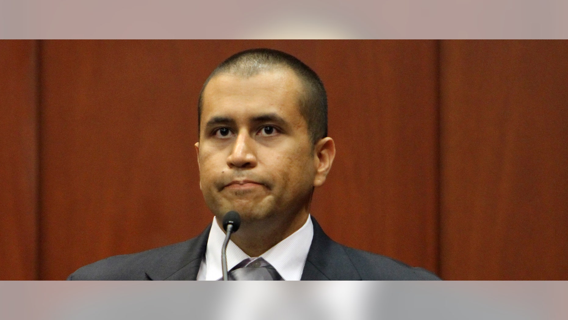 George Zimmerman appears before Circuit Judge Kenneth R. Lester Jr. Friday, April 20, 2012, during a bond hearing in Sanford, Fla. Lester says Zimmerman can be released on $150,000 bail as he awaits trial for the shooting death of Trayvon Martin. Zimmerman is charged with second-degree murder in the shooting of Martin. He claims self-defense. (AP Photo/Orlando Sentinel, Gary W. Green, Pool)