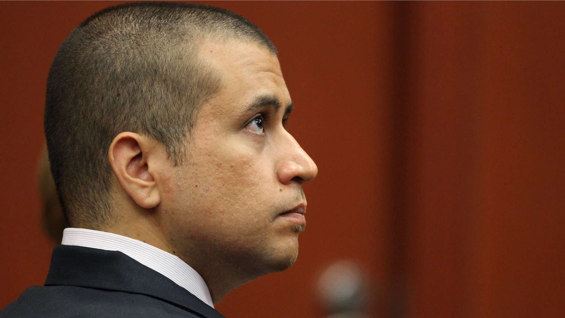 George Zimmerman appears before Circuit Judge Kenneth R. Lester Jr. Friday, April 20, 2012, during a bond hearing in Sanford, Fla. (AP Photo/Orlando Sentinel, Gary W. Green, Pool)