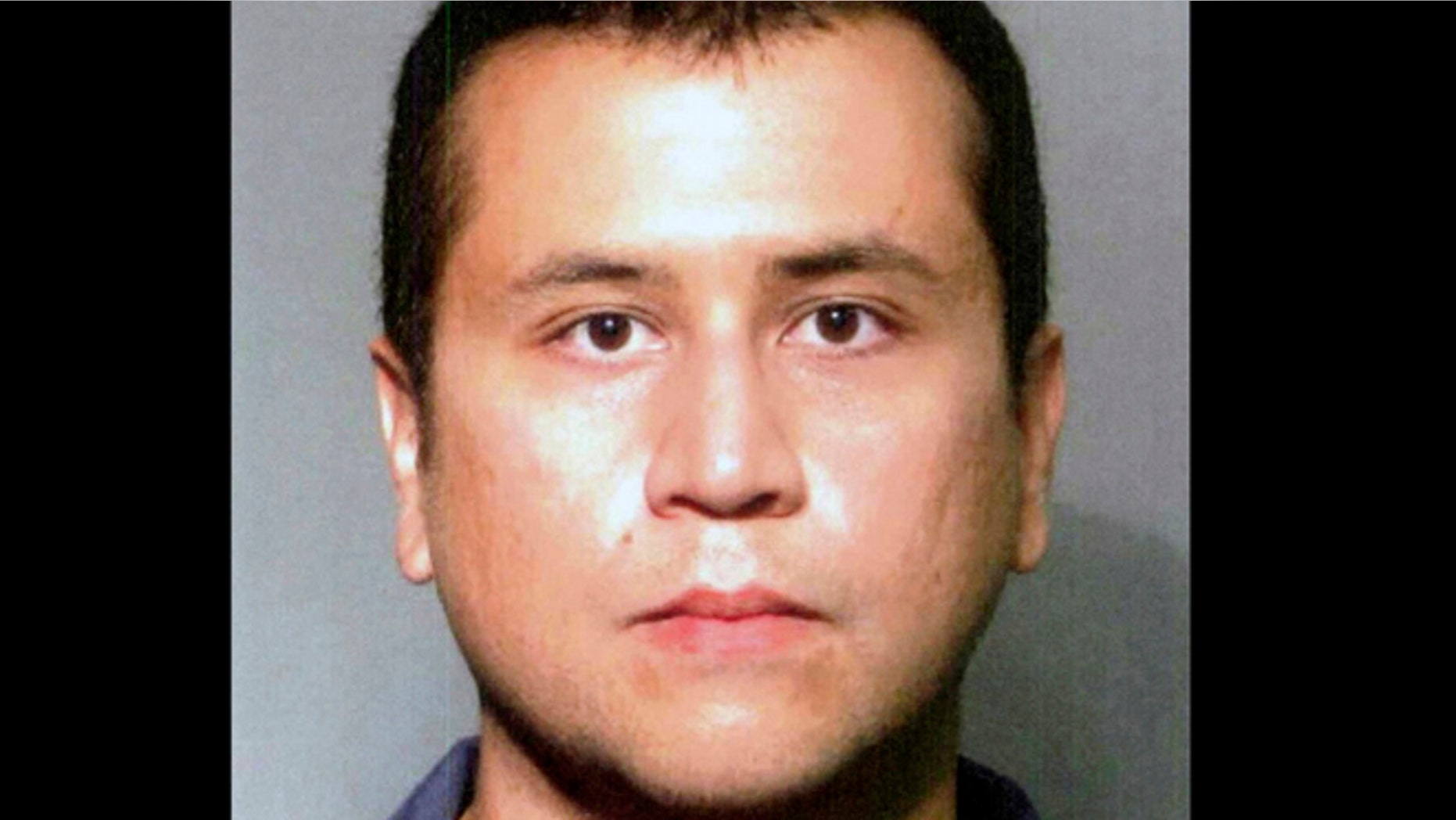 FILE: Booking photo provided by the Seminole County Sheriff's Office shows George Zimmerman.