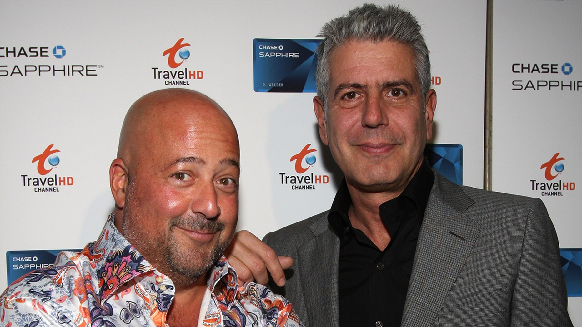 Chefs Andrew Zimmern and Anthony Bourdain attend the Chase Sapphie Card Launch at Weather Room at Top of the Rock on October 22, 2009 in New York City.