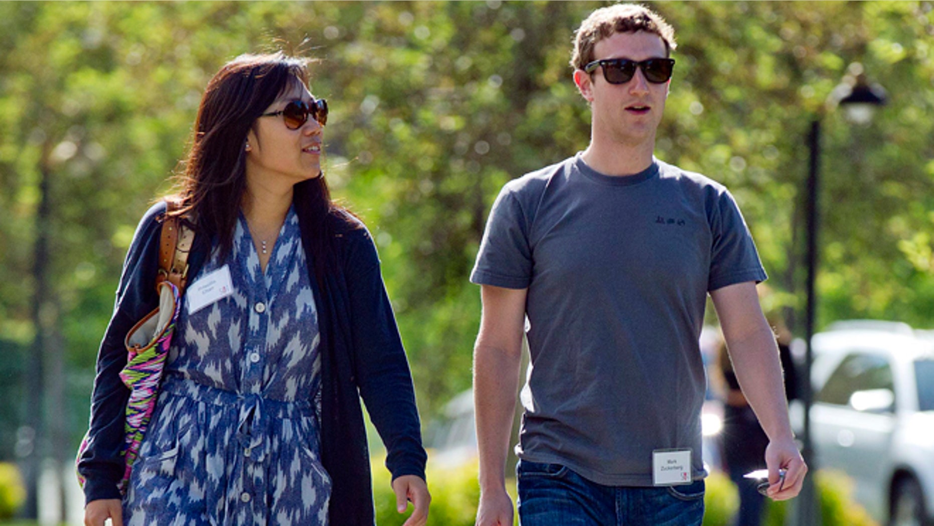 Mark Zuckerberg, president and CEO of Facebook, and his wife Priscilla Chan