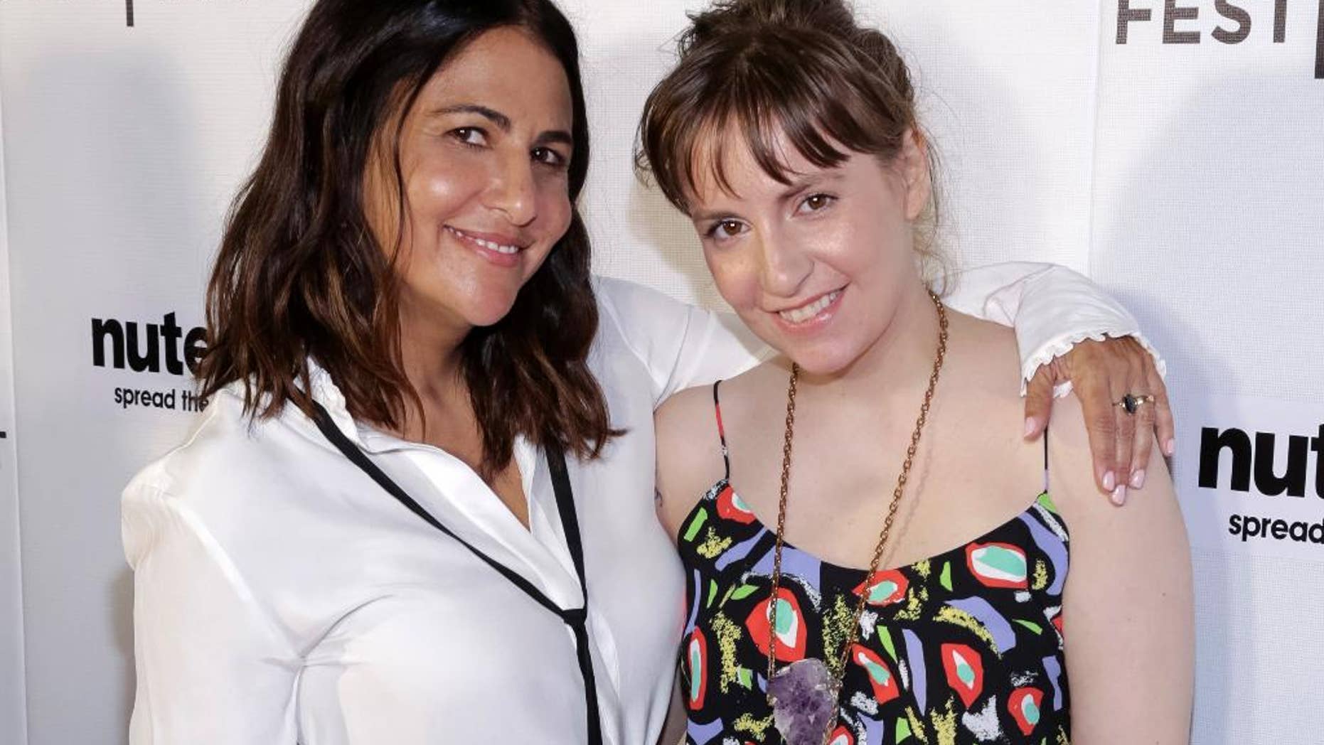FILE - In this April 22, 2017, file photo, producers Jenni Konner, left, and Lena Dunham attend a screening of "Tokyo Project" during the 2017 Tribeca Film Festival in New York. Now that HBO’s “Girls” has wrapped its six-year run, the women behind the series are focusing on their other female-centered project: turning their biweekly digital newsletter, Lenny, into a real-life experience. Dunham and Konner announced a six-city tour Tuesday, April 25 that will bring LennyLetter.com to life as a variety show. (Photo by Brent N. Clarke/Invision/AP, File)