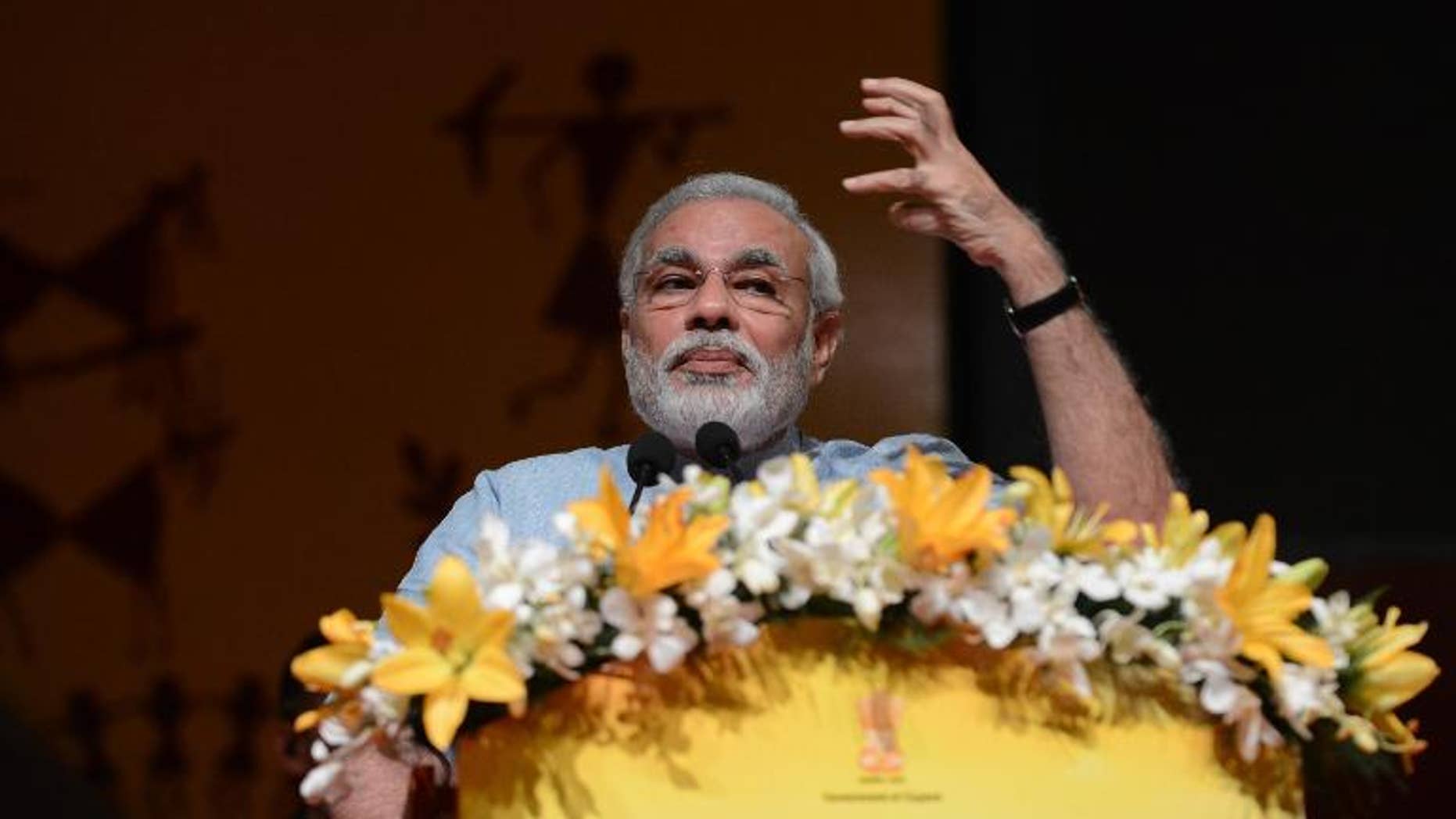 Gujarat state Chief Minister Narendra Modi speaks in Gandhinagar on September 9, 2013.