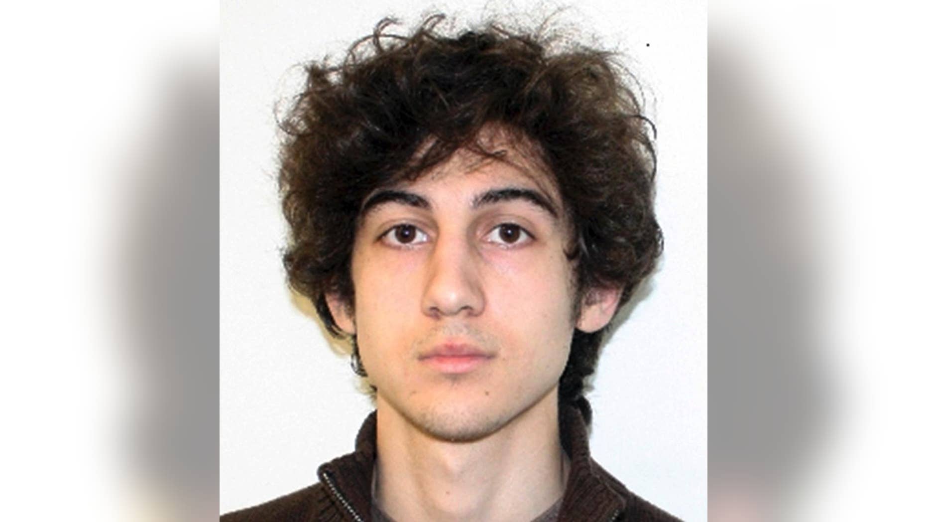 FILE - This file photo released April 19, 2013 by the Federal Bureau of Investigation shows Boston Marathon bombing suspect Dzhokhar Tsarnaev, convicted of 30 federal charges in the 2013 bombing at the marathon finish line that killed three people and injured more than 260. Defense lawyers for Tsarnaev said in a court filing Monday, Aug. 17, 2015, saying that the Boston Marathon bomber deserves a new trial in a different location where jurors will be impartial. (Federal Bureau of Investigation via AP, File)