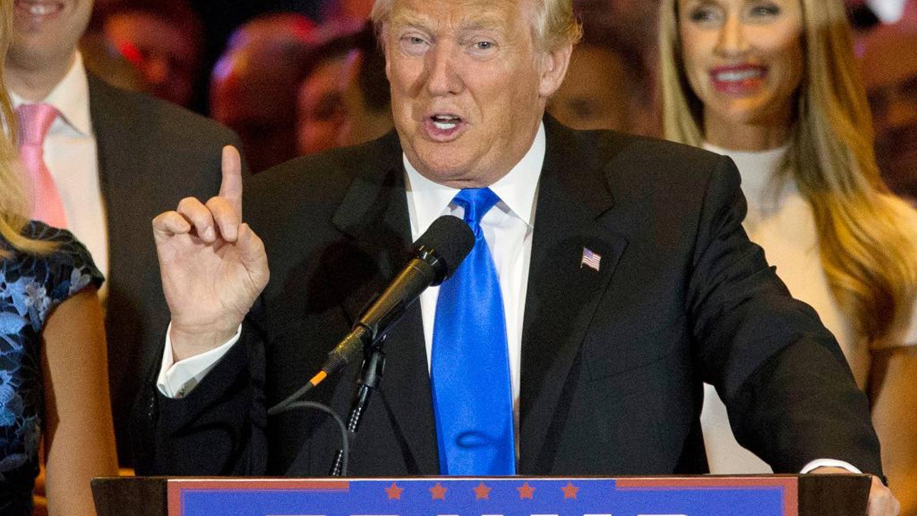 FILE - In this May 3, 2016, file photo, Republican presidential candidate Donald Trump speaks in New York. Trump is now his party's presumptive nominee, but in many ways, he's breaking the Republican mold. On a handful of issues, from trade to national defense, Trump has the potential to run to the left of likely Democratic candidate Hillary Clinton. And on others, from taxes to social security, he sounds an awful lot like a Democrat. (AP Photo/Mary Altaffer, File)