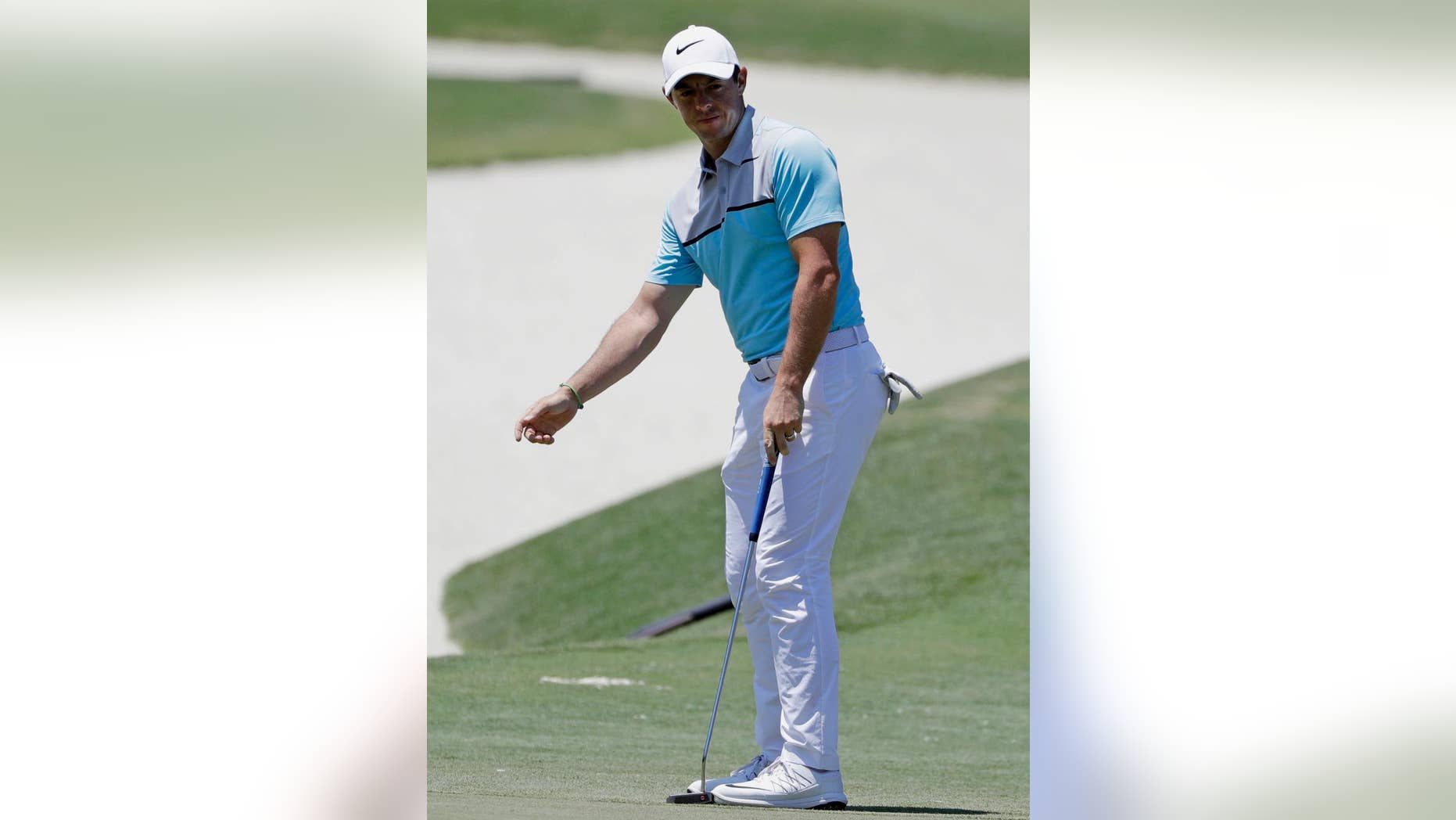 Rory McIlroy, of Northern Ireland, gestures after missing a birdie putt on the seventh green during the second round of The Players Championship golf tournament Friday, May 12, 2017, in Ponte Vedra Beach, Fla. (AP Photo/Chris O'Meara)