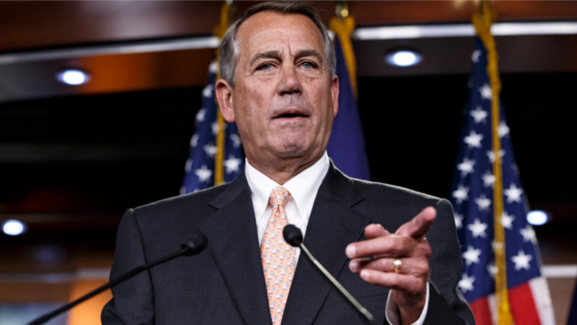 House Speaker John Boehner of Ohio responds to reporters about the problems in passing the Homeland Security budget because of Republican efforts to block President Barack Obama's executive actions on immigration, Thursday, Feb. 26, 2015, during a news conference on Capitol Hill in Washington. The House voted last month to end Homeland Security funding on Saturday unless Obama reverses his order to protect millions of immigrants from possible deportation. After Democratic filibusters blocked the bill in the Senate, the chamber's Republican leaders agreed this week to offer a "clean" funding measure, with no immigration strings attached. (AP Photo/J. Scott Applewhite)