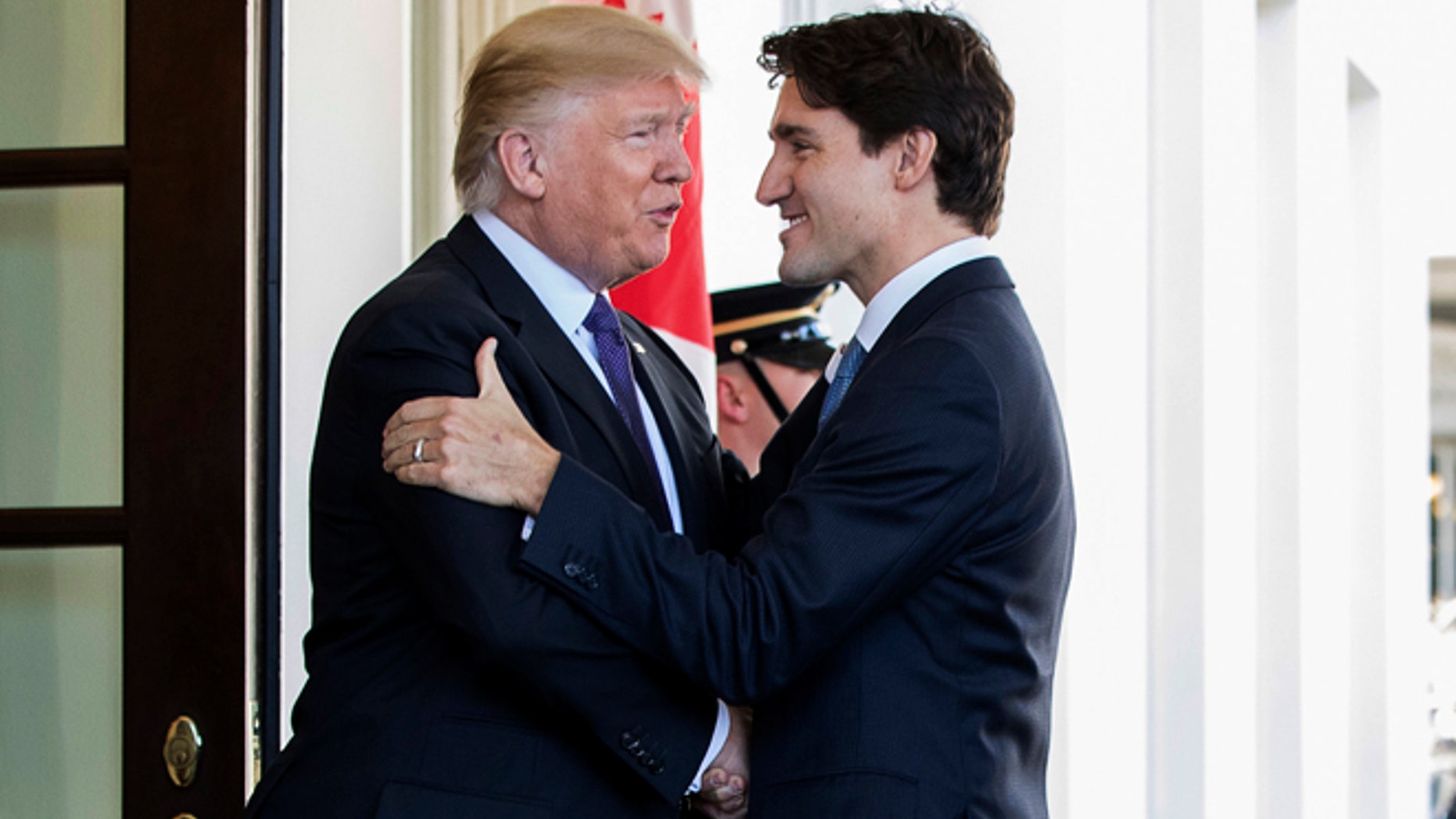 Feb. 13, 2017: President Donald Trump welcomes Canadian Prime Minister Justin Trudeau outside the West Wing of the White House in Washington.