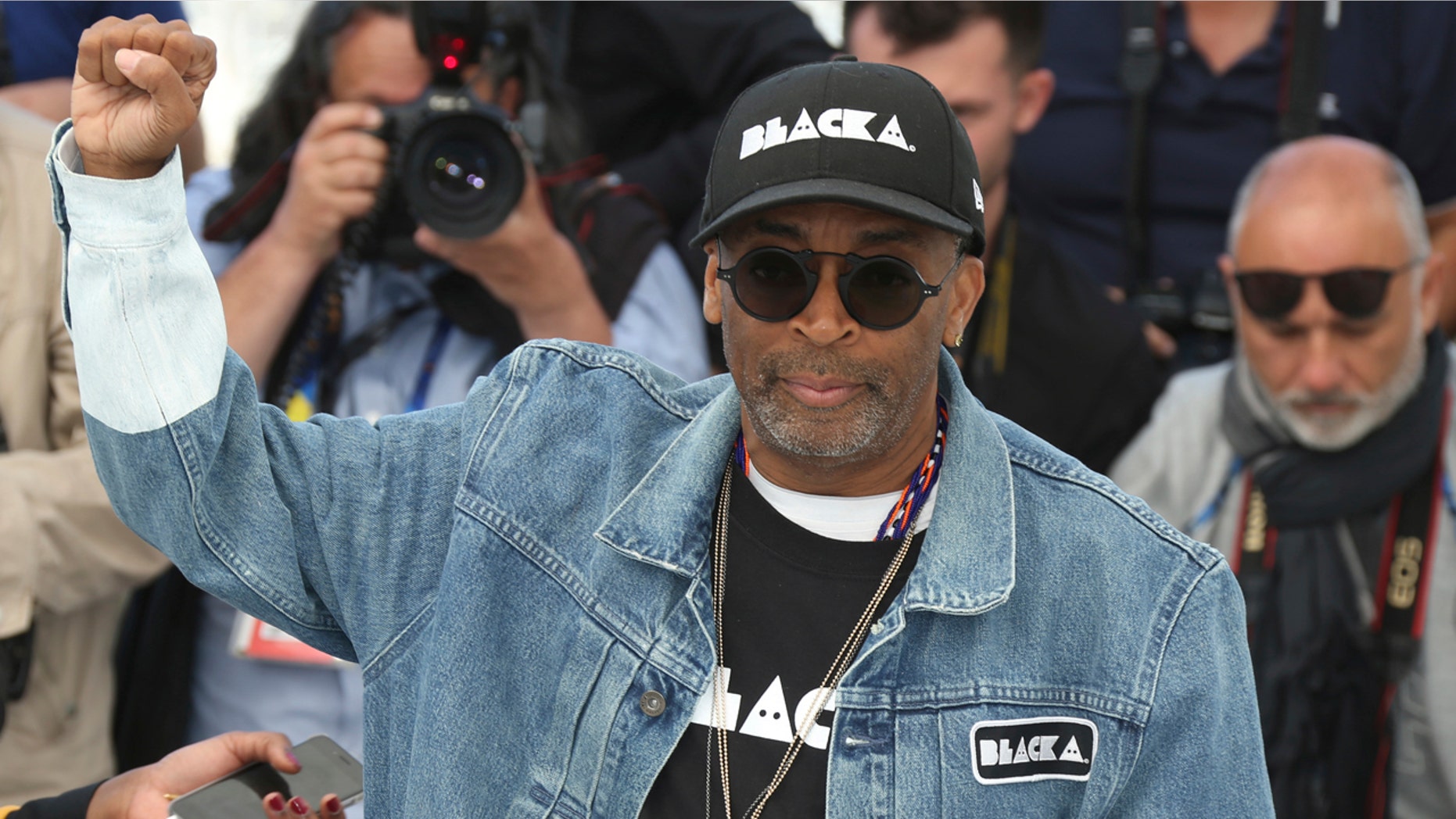 Spike Lee called out President Trump during his speech at the premiere of his new film, 'BlacKkKlansman,' accusing him of mishandling the Charlottesville white supremacy protests.