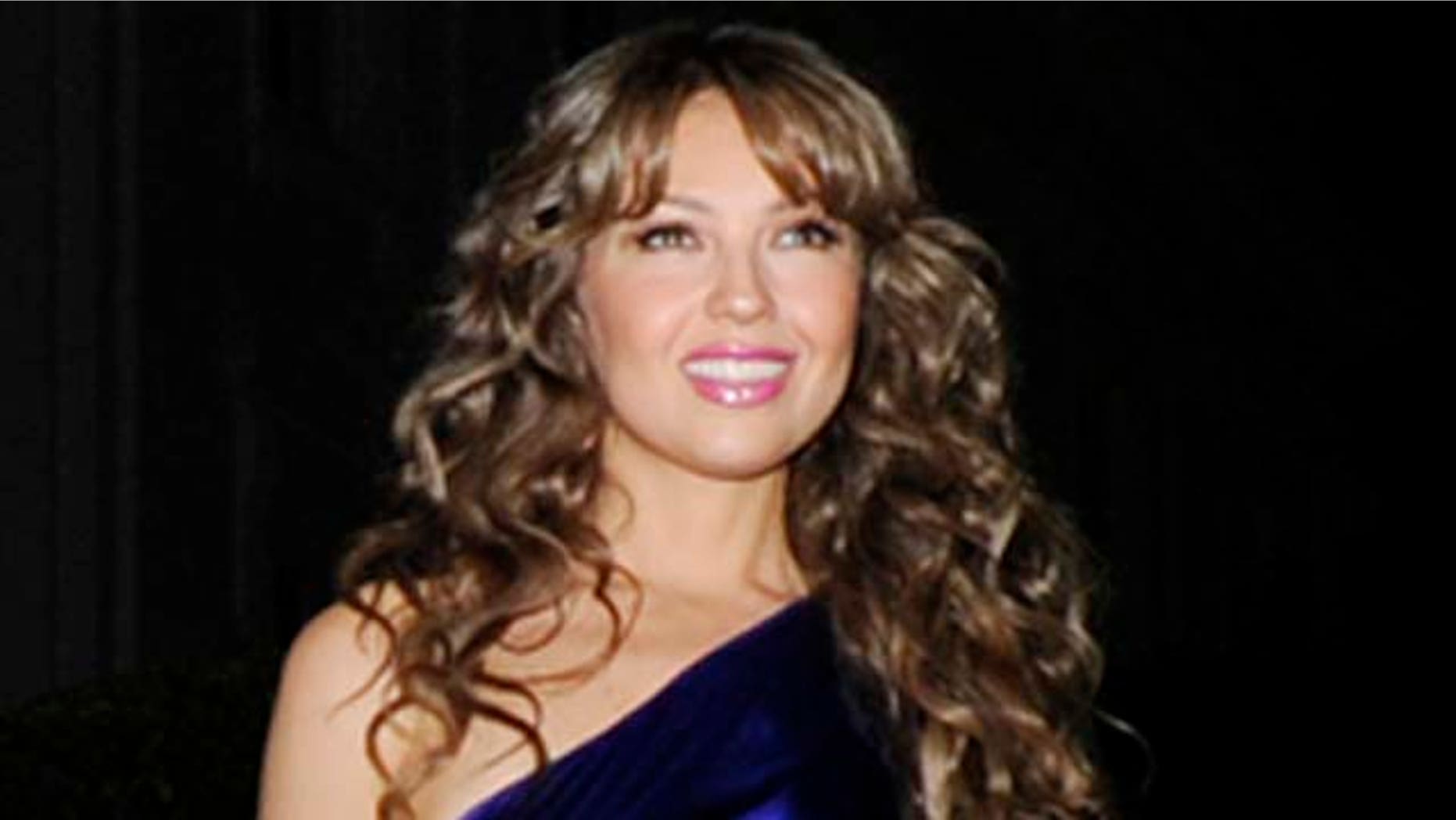 October 13, 2009: Thalía attends the White House music series 'Fiesta Latina' on the South Lawn of the White House in Washington, DC.