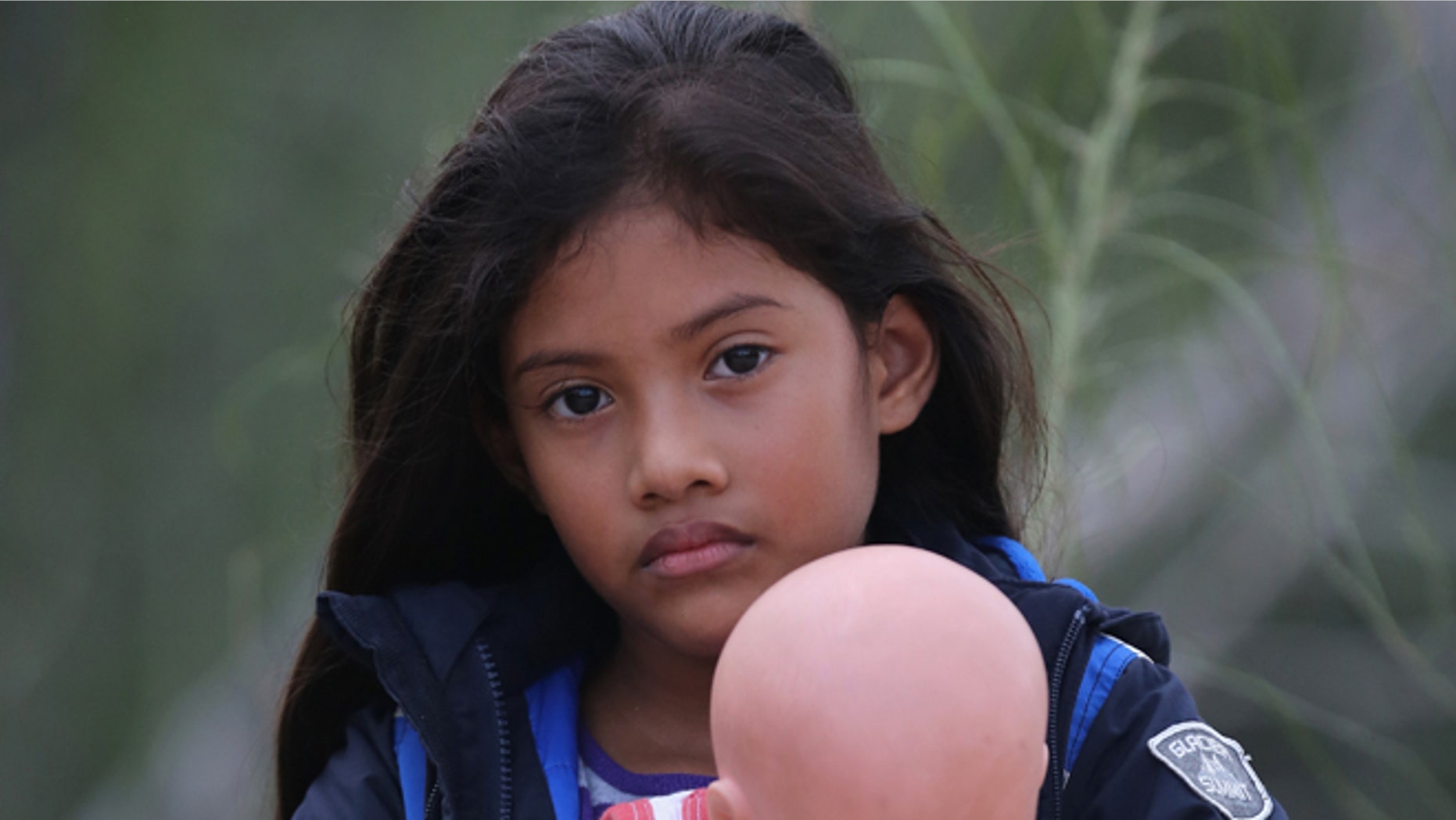 Salvadorian Stefany Marjorie, 8, after crossing the Rio Grande from Mexico on July 24, 2014 near Mission, Texas.