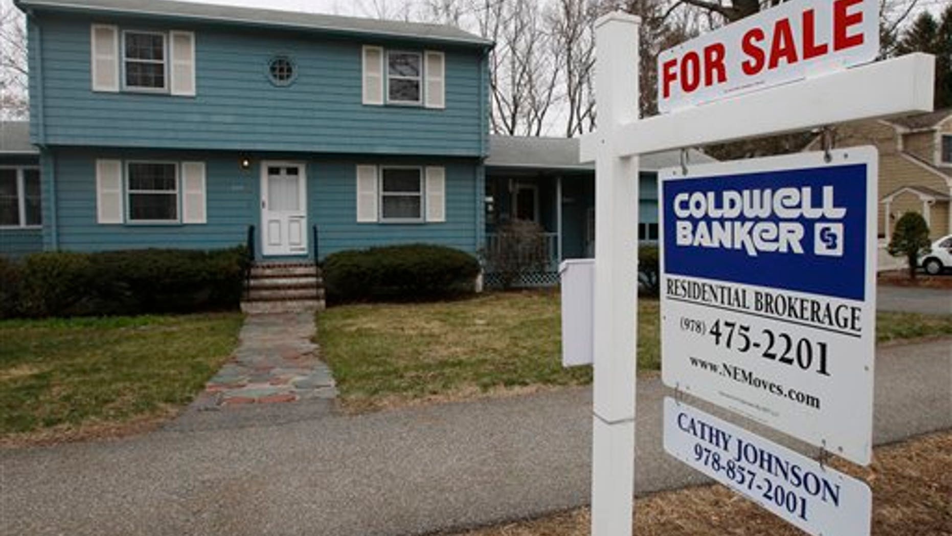 In this April 12, 2011 photo, an existing home is posted for sale in North Andover, Mass. Sales of existing-home sales rose in March, continuing an uneven recovery that began after sales bottomed last July, according to the National Association of Realtors. (AP Photo/Charles Krupa)