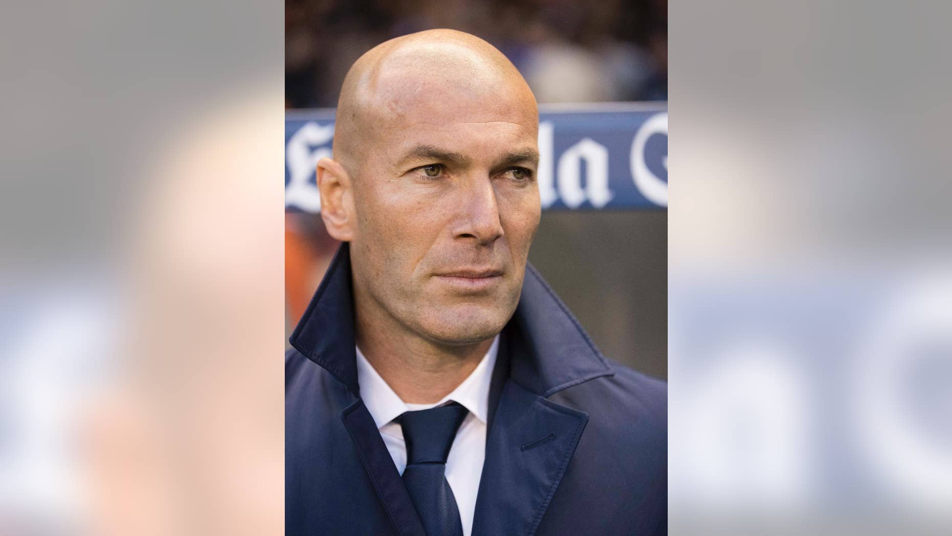Real Madrid's coach Zinedine Zidane during a Spanish La Liga soccer match between Deportivo La Coruna and Real Madrid at the Riazor stadium in A Coruna, Spain, Wednesday April 26, 2017. (AP Photo/Lalo R. Villar)