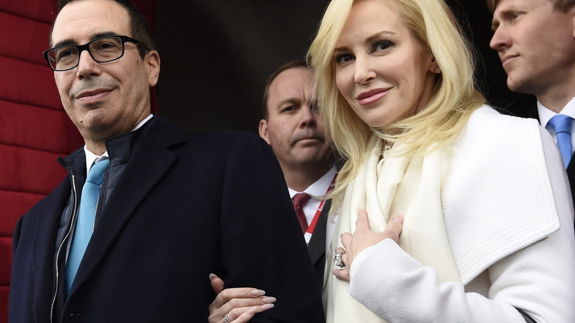 FILE: Treasury Secretary Steven Mnuchin and his wife, Louise Linton in Washington