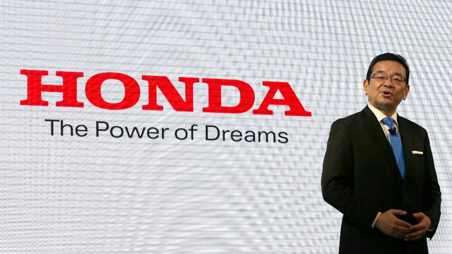FILE - In this March 10, 2016 file photo, Honda Motor Co. President and Chief Executive Takahiro Hachigo speaks during a press conference at the automaker's headquarters in Tokyo. Honda is reporting a better-than-expected 174.6 billion yen profit ($1.7 billion) for the fiscal first quarter as it gradually recovers from plant damage caused by a quake in southwestern Japan. Analysts surveyed by FactSet had forecast at 133 billion yen ($1.3 billion) quarterly profit. The April-June 2016 profit fell 6 percent from a year ago, when the Japanese automaker earned 186 billion yen. Earlier this year, Honda sank into losses over a massive air-bag recall at its supplier Takata. (AP Photo/Shizuo Kambayashi, File)