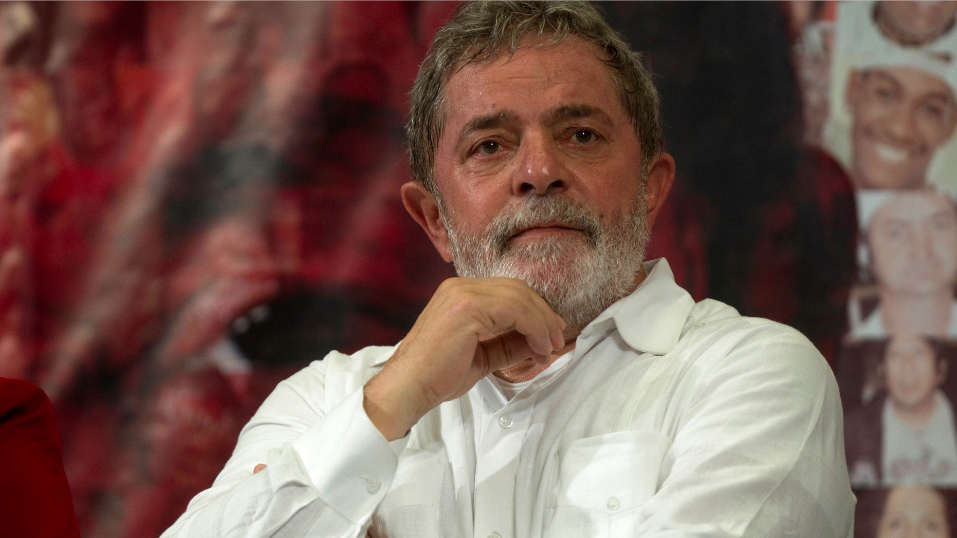 FILE - In this Dec. 23, 2010 file photo, Brazil's President Luiz Inacio Lula da Silva attends a meeting in Sao Paulo, Brazil. Doctors say the former Brazilian president has a tumor in his larynx. Sao Paulo's Sirio Libanes Hospital say in a statement that the tumor was detected Saturday during exams conducted on Silva. The statement says the former president will undergo chemotherapy treatment starting next week. (AP Photo/Andre Penner)