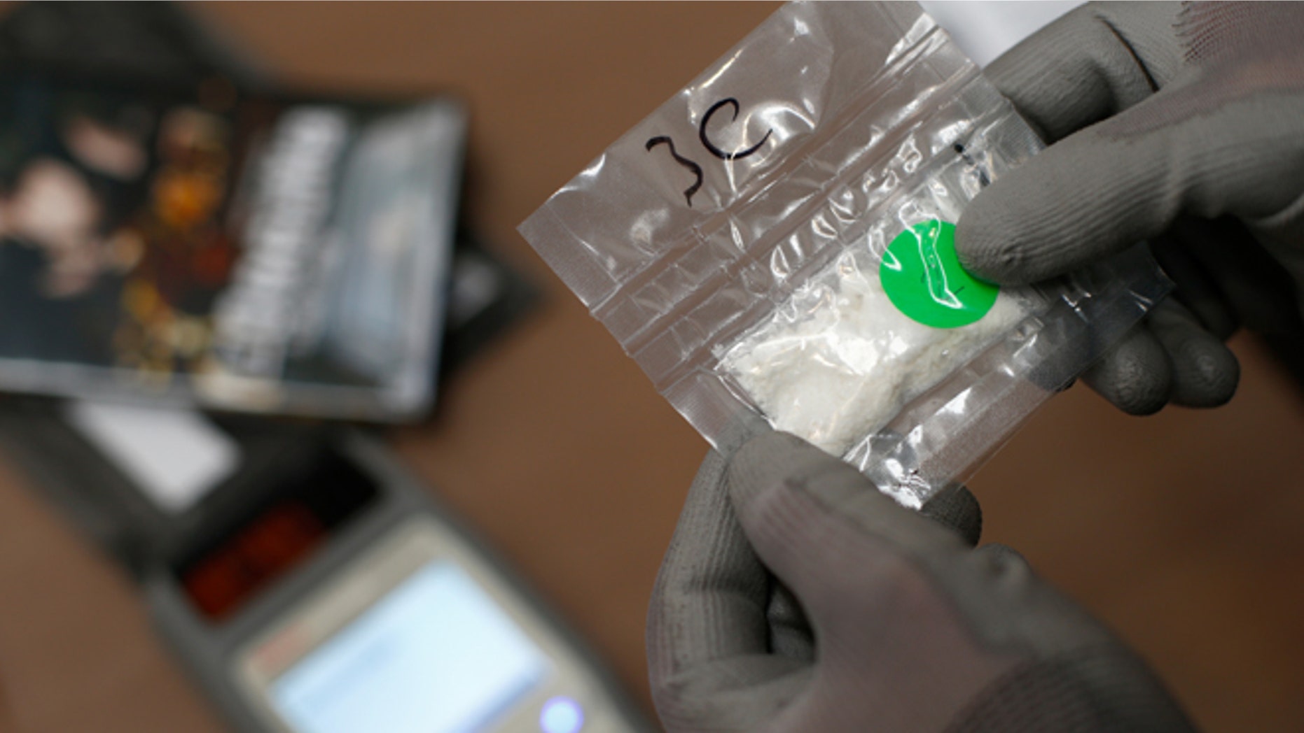 AUCKLAND, NEW ZEALAND - AUGUST 21: Drug detection equipment, cocaine and seized packages are pictured at the Auckland Airport Customs Air Cargo Inspection Facility on August 21, 2014 in Auckland, New Zealand. The New Zealand Prime Minister has allocated $335,000 to customs to enhance frontline screening at the border. (Photo by Phil Walter/Getty Images)
