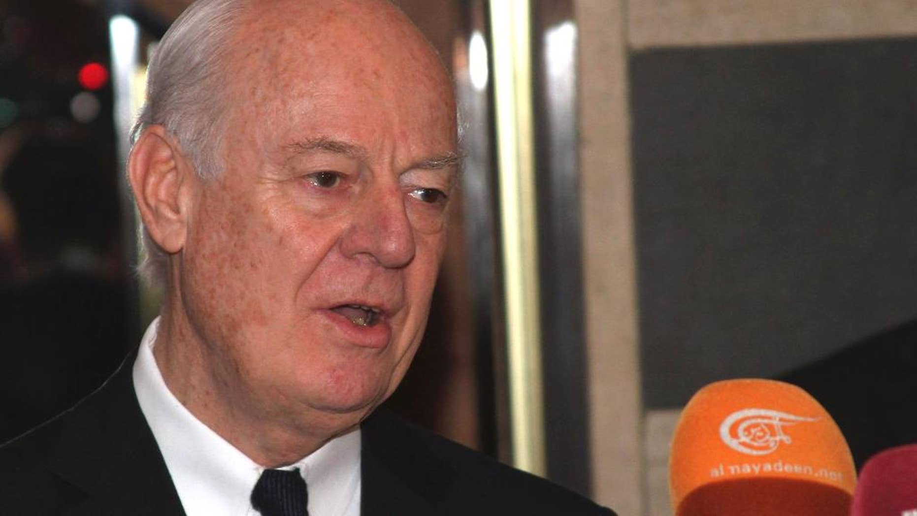 U.N. Special Envoy for Syria Staffan de Mistura speaks with reporters in Damascus, Syria Wednesday, Feb. 11, 2015 following a meeting with Syrian President Bashar Assad. De Mistura said he met with Assad to discuss a U.N. initiative to cease hostilities in the northern city of Aleppo. (AP Photo)