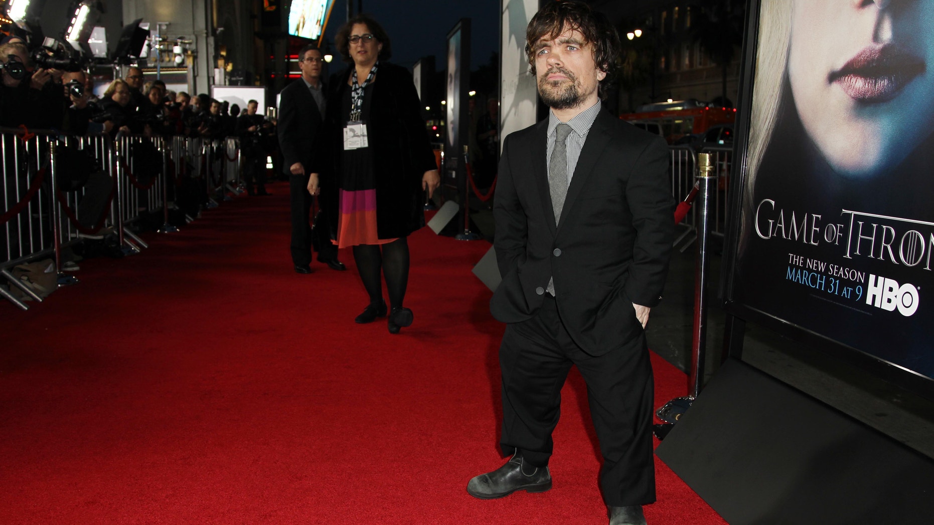 Cast member Peter Dinklage arrives at the premiere for the third season of the HBO television series "Game of Thrones" at the TCL Chinese Theatre on Monday, March 18, 2013 in Los Angeles.