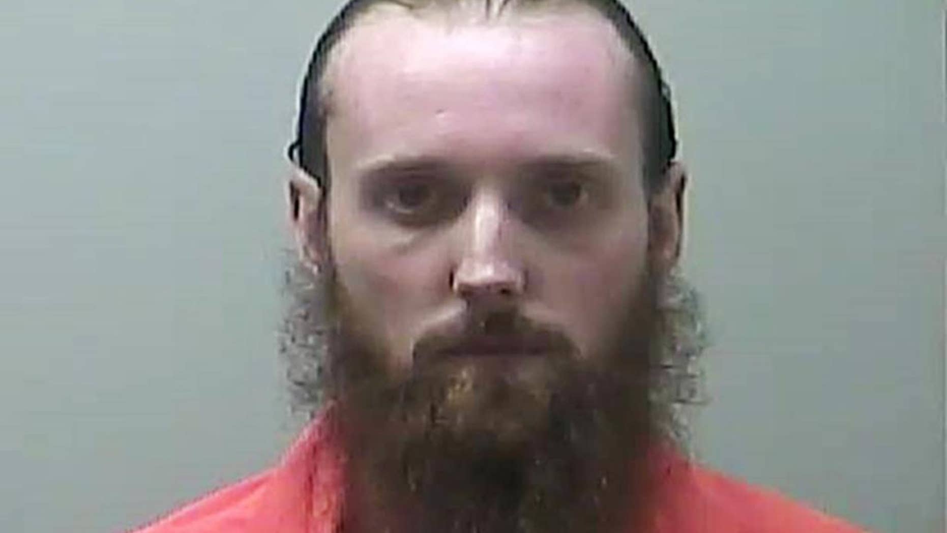 This undated photo provided by the Midland County Sheriff's Office in Midland, Mich., shows Sebastian Gregerson, of Detroit. Gregerson, who is accused of amassing weapons and buying explosives from an undercover agent, was arraigned Tuesday, Aug. 16, 2016. A federal court magistrate entered a not-guilty plea Tuesday on Gregerson's behalf. (Midland County Sheriff's Office via AP)