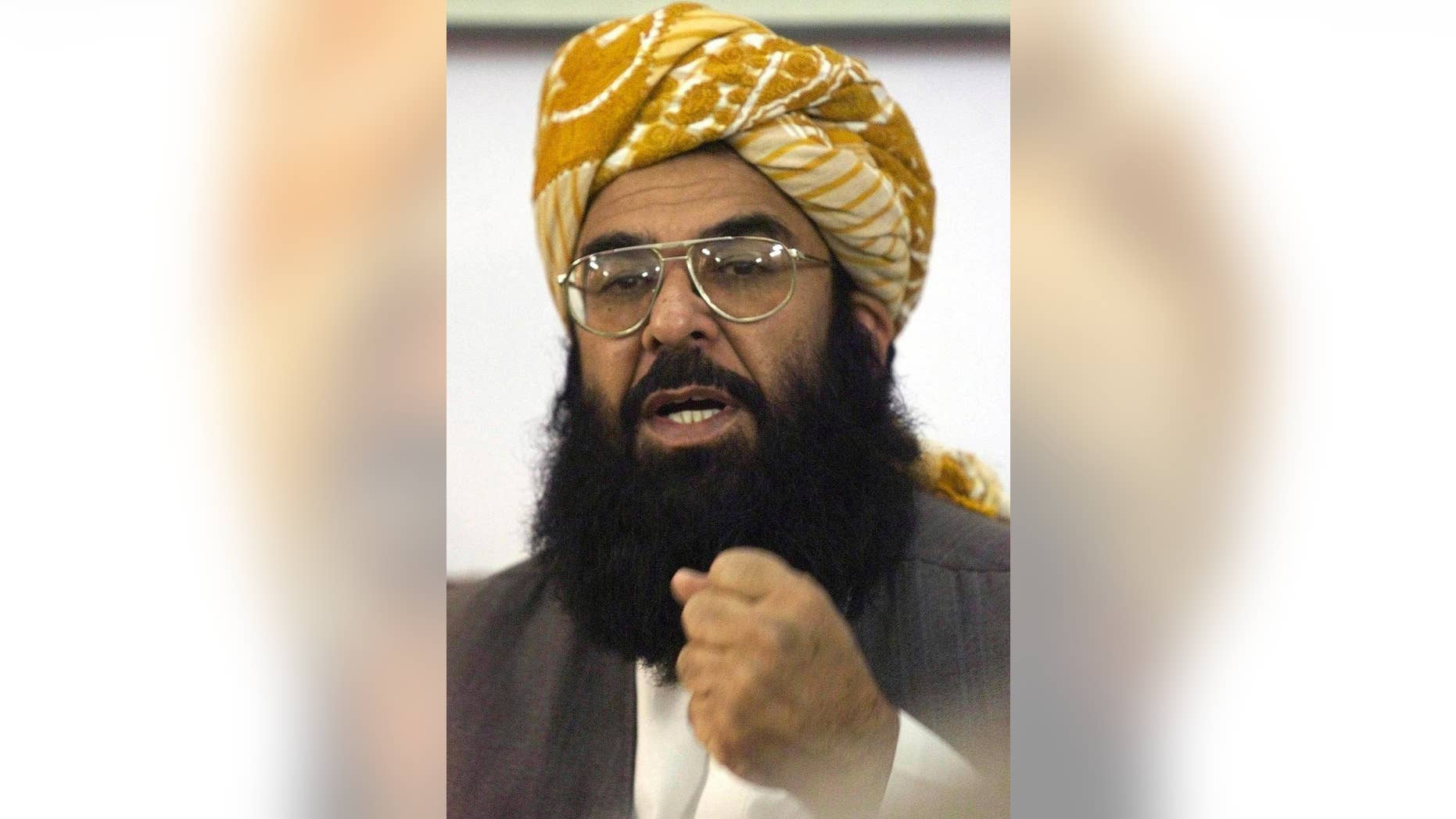 FILE - In this Jan. 24, 2003 file photo, Pakistan's Islamic cleric Ghafoor Haideri, addresses a news conference in Quetta, Pakistan. The chairman of Pakistan's senate says the body will not welcome any U.S. delegation, member of Congress or dignitary in Islamabad. The move comes after the U.S. failed to issue a visa to Ghafoor Haideri, the senate's deputy chairman, a member of the right-wing Jamiat Ulema-e-Islam political party. (AP Photo/B.K. Bangash, FILE)