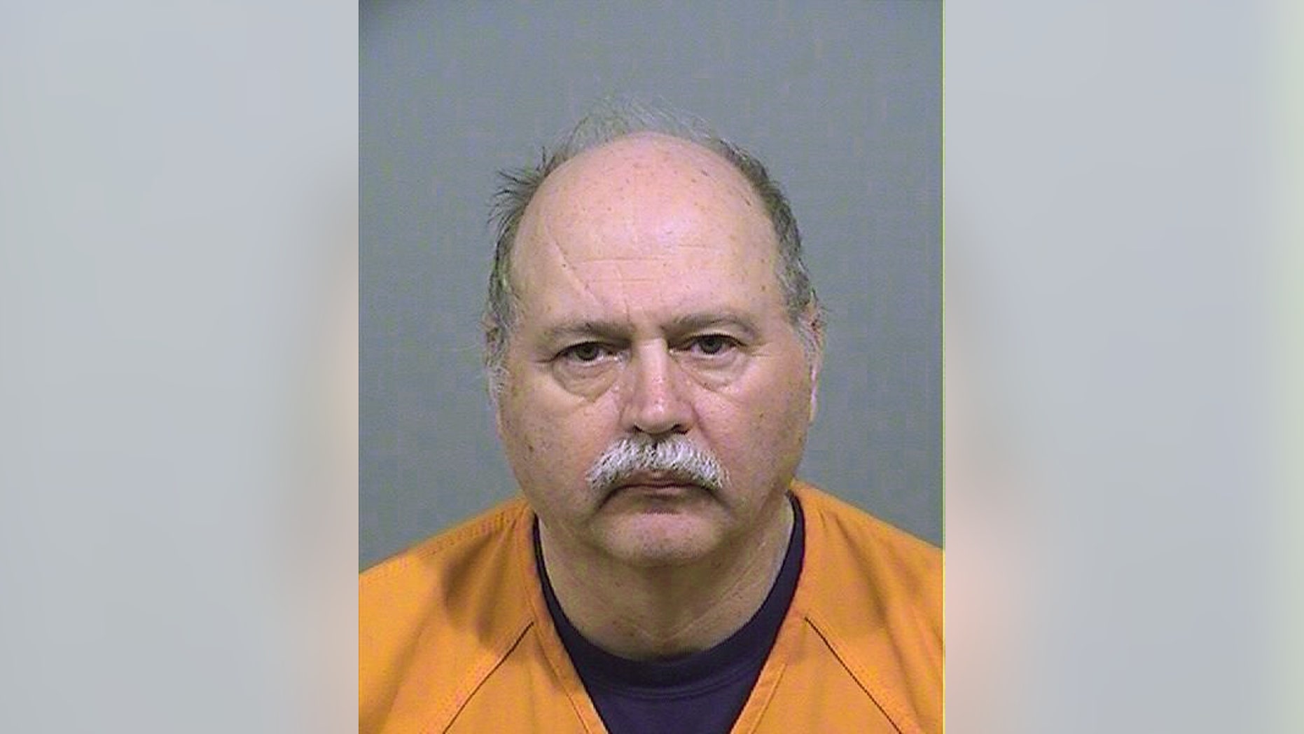 This photo provided by Cumberland County,Maine shows Ricky Plummer. Authorities say Plummer, an Old Orchard Beach Fire Chief, has been arrested on an arson charge over a grass and marsh blaze fought by more than 100 firefighters. Plummer was arrested at around 2 a.m. Saturday, May 7, 2016 over an April 15 fire that burned 42 acres at the Jones Creek Marsh and led to evacuations. (Cumberland County,Maine via AP)
