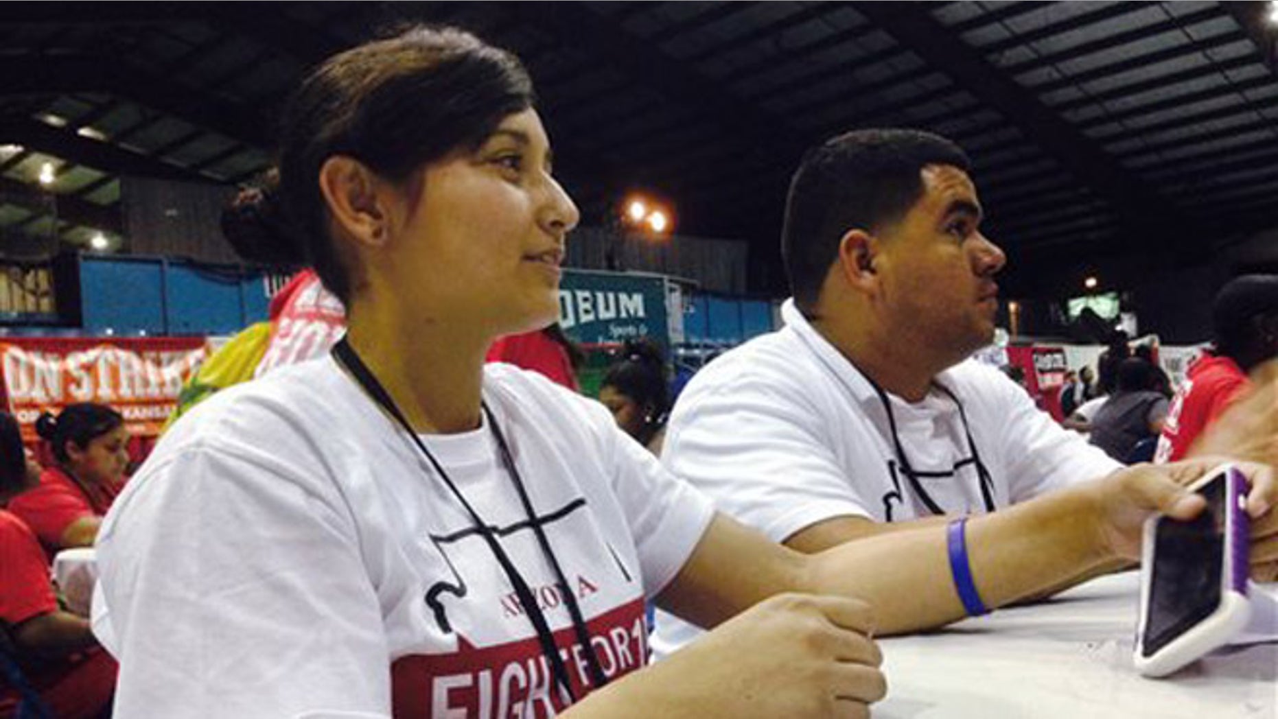 Fast food workers from across the U.S. attend a convention in Villa Park, Ill. on Saturday, July 26, 2014. Comparing their campaign to the civil rights movement, fast food workers from across the country voted Saturday to escalate their efforts for $15-an-hour pay and union membership by using nonviolent civil disobedience. (AP Photo/Tammy Webber)