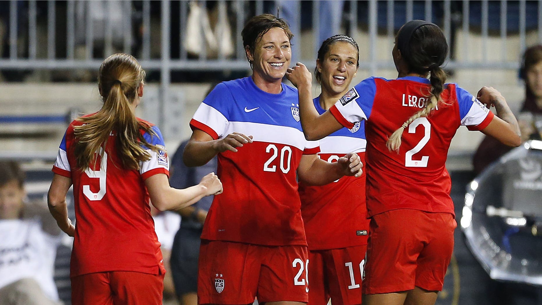 United States forward Abby Wambach (20) celebrates a goal with teammates Heather O'Reilly (9), Carli Lloyd (10) and Sydney Leroux in the second half against Costa Rica during the CONCACAF championship soccer match in Chester, Pa., Sunday, Oct. 26, 2014. The United States defeated Costa Rica 6-0. (AP Photo/Rich Schultz)