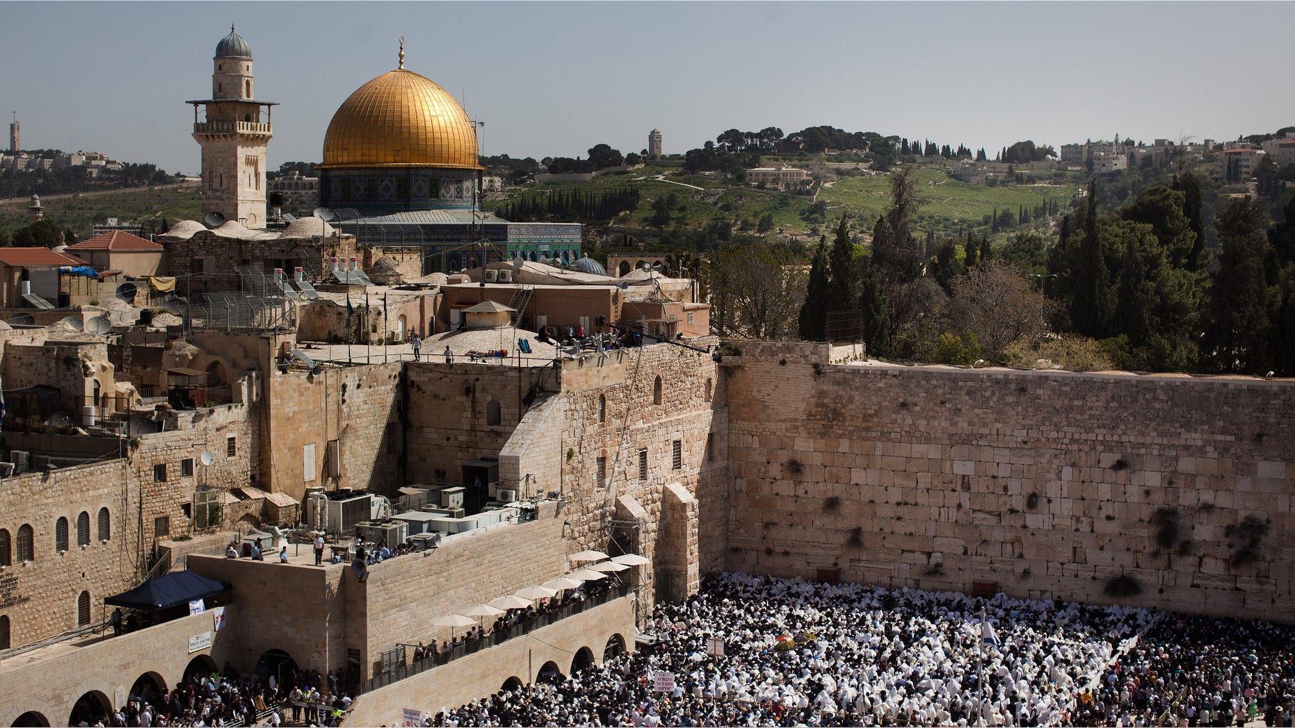 JERUSALEM, ISRAEL - APRIL 09: (ISRAEL OUT) Thousands of Israelis attend the Annual Cohanim prayer, or Priest's blessing, for the Pesach (Passover) holiday,on April 9, 2012 at the Western Wall in Jerusalem's old city. Thousands of Jews make the pilgrimage to Jerusalem during Pesach, which commemorates the Israelites' exodus from Egypt some 3,500 years ago. (Photo by Uriel Sinai/Getty Images)
