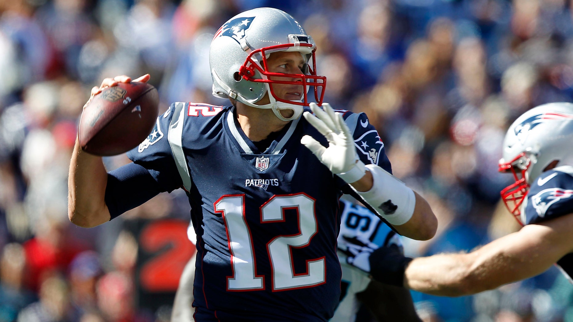 File photo - New England Patriots quarterback Tom Brady passes the ball during the first quarter against the Carolina Panthers at Gillette Stadium on Oct 1, 2017. (Stew Milne-USA Today Sports)