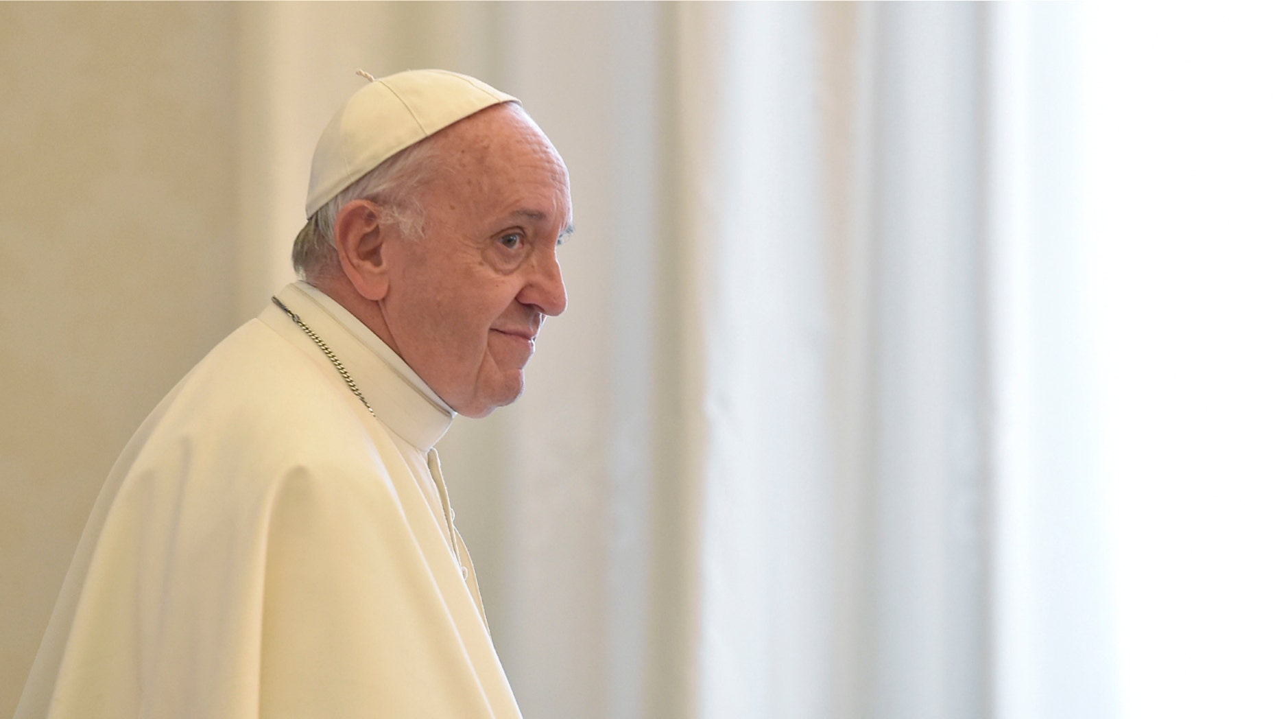 Pope Francis stands during the audience with Ecuador's President Lenin Moreno at the Vatican, Saturday, Dec. 16, 2017.