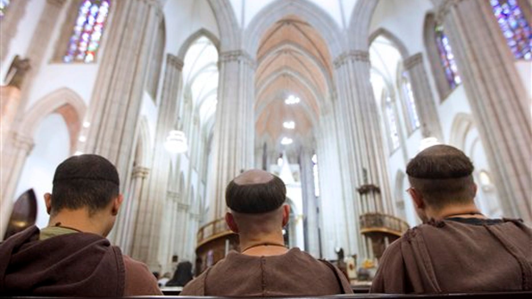 Sept. 5: Monks attend a Mass at the Sao Paulo Metropolitan Cathedral in Sao Paulo, Brazil.