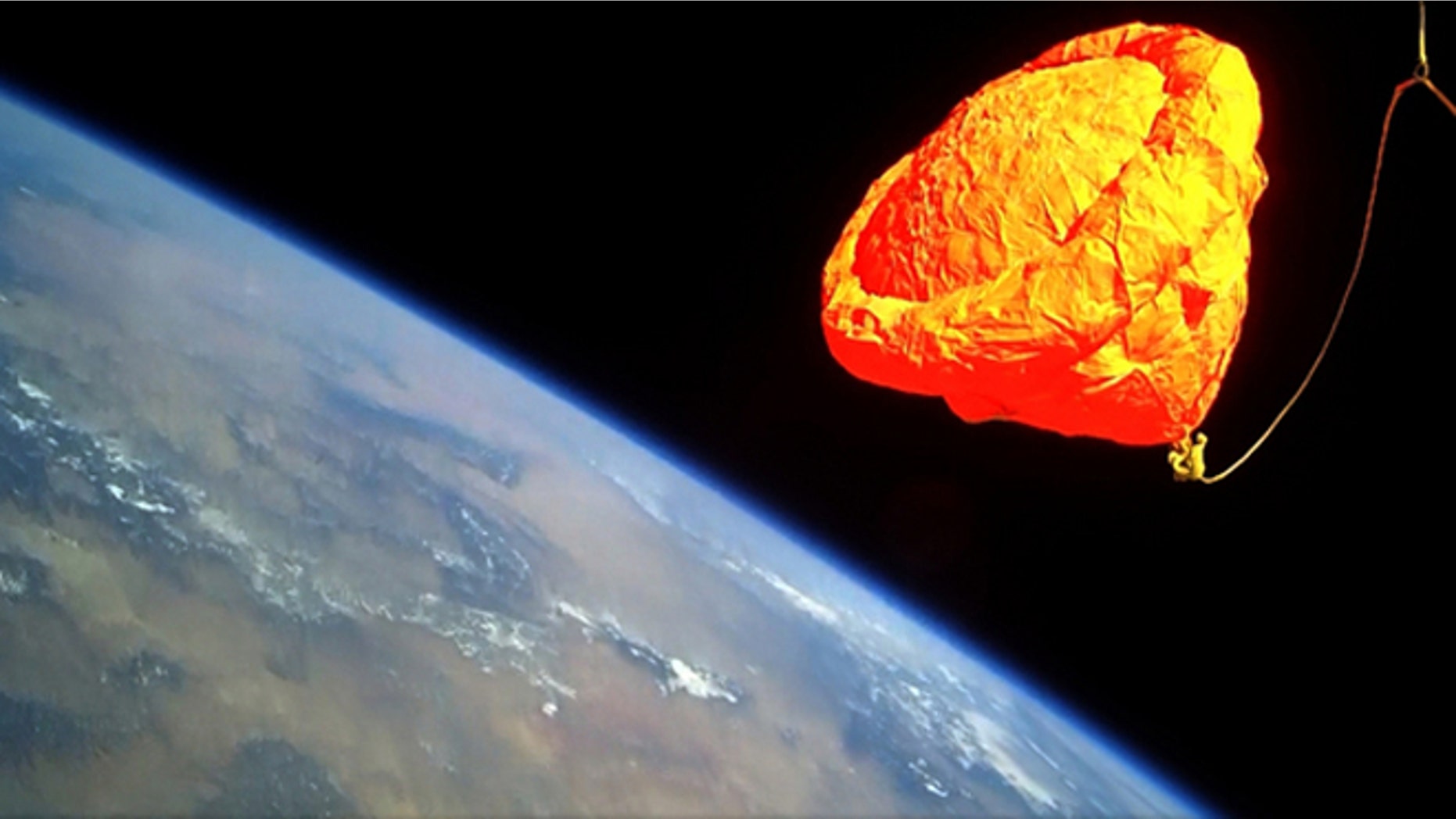 A balloon-parachute recovery system was deployed during a Jan. 28, 2012 flight of an Armadillo Aerospace rocket.