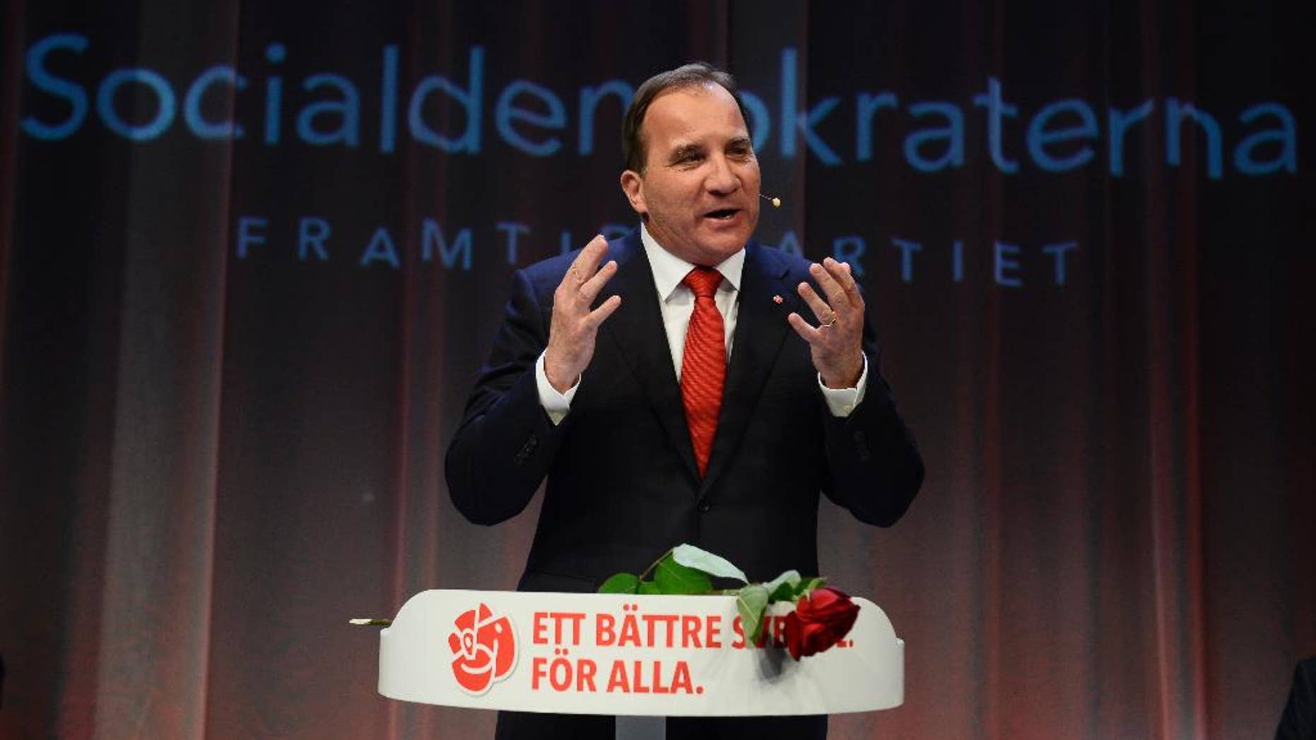 Opposition leader Stefan Lofven speaks at the election night party of the Social Democrats, in Stockholm, Sweden, on Sunday, Sept. 14, 2014. Sweden's Social Democrats were poised to return to power as the leaders of a left-leaning bloc that defeated the center-right government in a parliamentary election Sunday, but without an absolute majority. (AP Photo / News Agency TT, Jonas Ekstromer) SWEDEN OUT