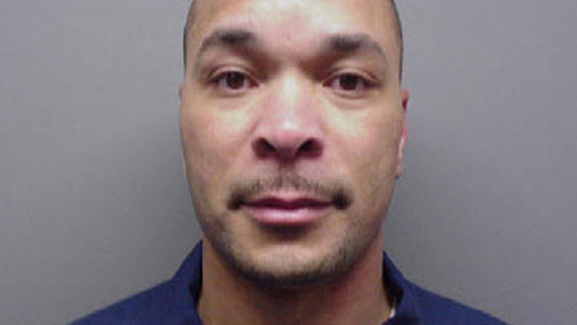 In this undated photo released by the Michigan Department of Corrections, Gregory Green is shown. The bodies of two young children and two teenagers were found at a Dearborn Heights, Mich., home early Wednesday, Sept. 21, 2016 after Green called 911 to report that he had killed them, police said. Two girls, ages 4 and 5, were asphyxiated in a car using exhaust, while a 17-year-old girl and a 19-year-old male were fatally shot. Green's wife was shot and stabbed but is in stable condition and is expected to survive. Green, 49, is in custody. Green had served 16 years in prison for second-degree murder — the fatal stabbing of his pregnant wife in 1991, records show. (Michigan Department of Corrections)