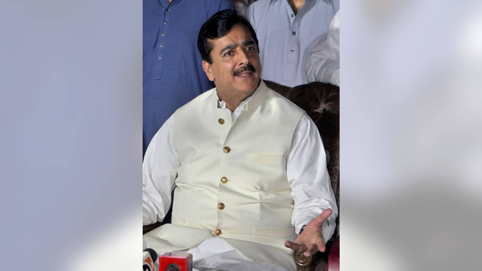Pakistan's former Prime Minister Yusuf Raza Gilani speaks during a press conference in Multan, Pakistan, Sunday, May 24, 2015. Gilani said he has spoken to his son Ali Haider for the first time since his abduction in 2013. Gilani said Haider's captors are demanding the release of several al-Qaida militants held in Pakistani prisons, adding that he plans to take up those demands with Pakistani officials. (AP Photo/Asim Tanveer)