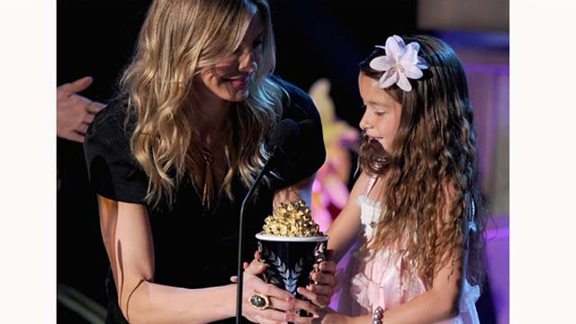 June 5, 2011: Actress Cameron Díaz presents the Best Line From A Movie award to actress Alexys Nycole Sánchez onstage during the 2011 MTV Movie Awards at Universal Studios' Gibson Amphitheatre on June 5, 2011 in Universal City, Calif.