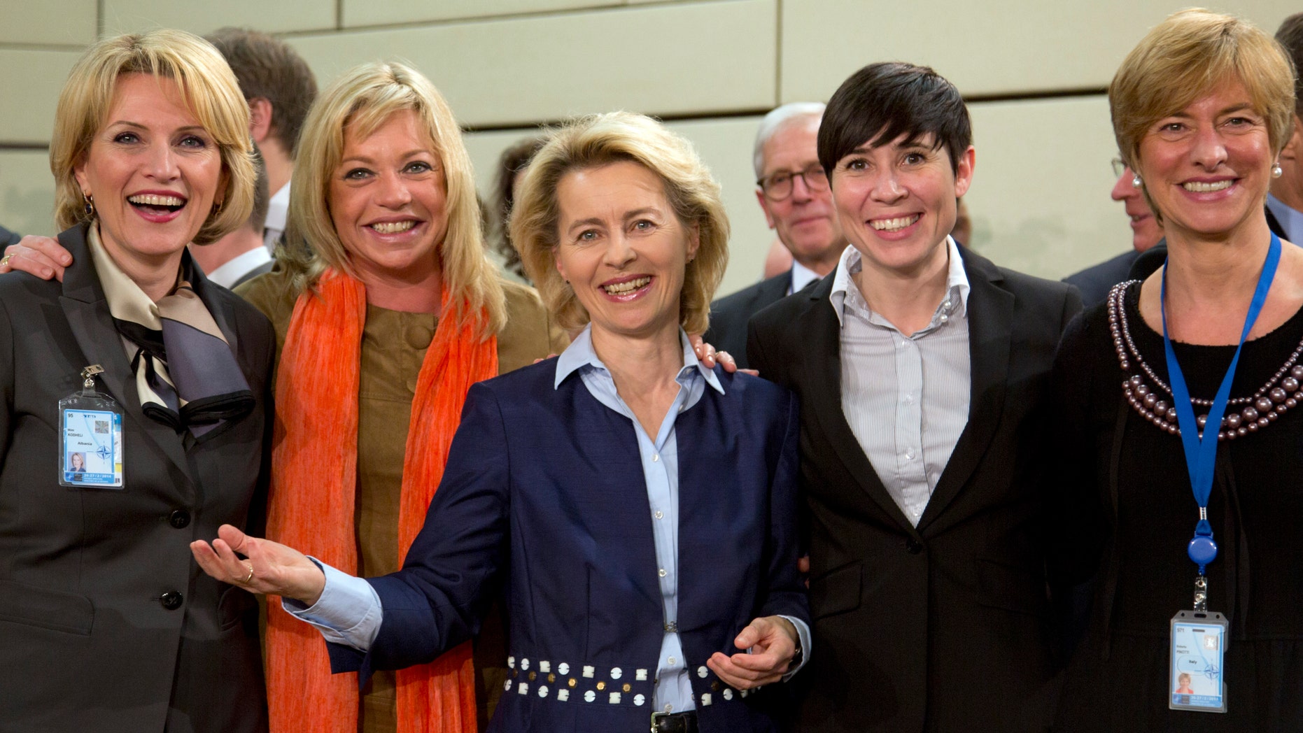 From left, defense ministers, Albania's Mimi Kodheli, Netherland's Jeanine Hennis-Plasschaert, Germany's Ursula von der Leyen, Norway's Ine Marie Eriksen Soreide and Italy's Roberta Pinotti pose for photographers prior to the start of a meeting of defense ministers of the North Atlantic Council at NATO headquarters in Brussels on Wednesday, Feb. 26, 2014. Frustrated with his Afghan counterpart, U.S. President Barack Obama is ordering the Pentagon to accelerate planning for a full U.S. troop withdrawal from Afghanistan by the end of this year. But Obama is also holding out hope that Afghanistan's next president may eventually sign a stalled security agreement that could prevent the U.S. from having to take that step. (AP Photo/Virginia Mayo)
