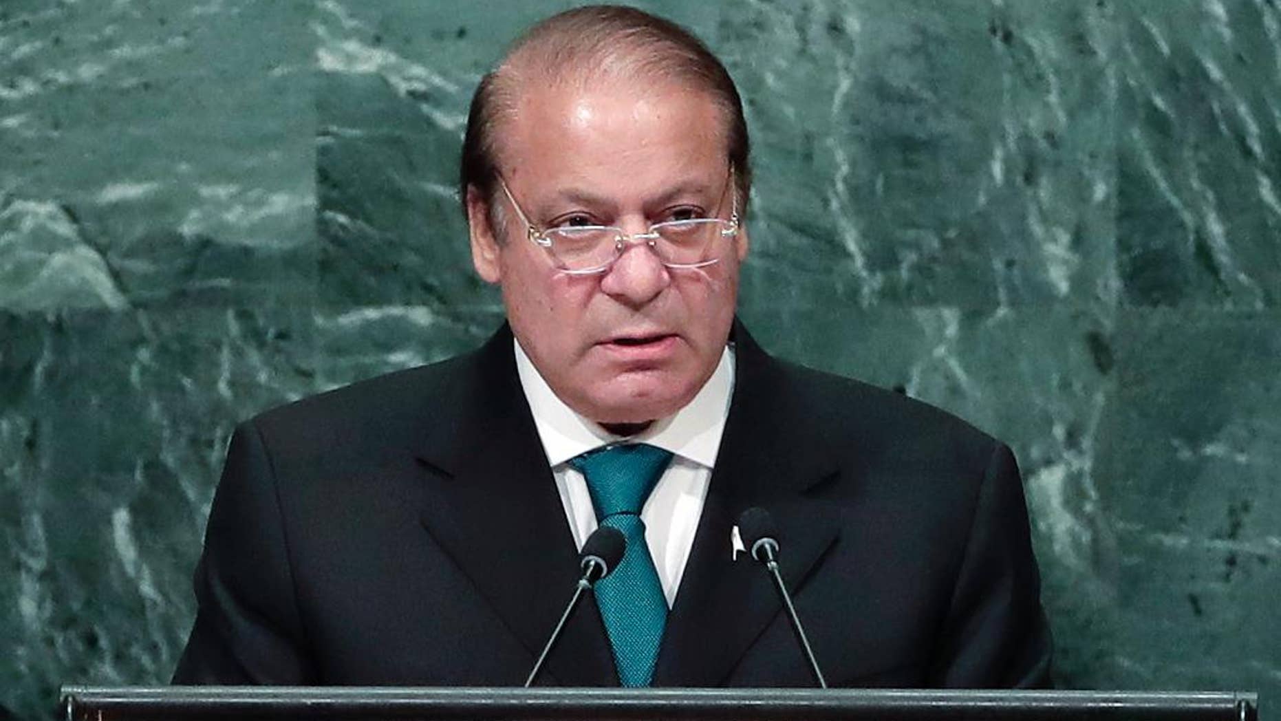 FILE - In this Sept. 21, 2016 file photo, Pakistani Prime Minister Nawaz Sharif speaks during the 71st session of the United Nations General Assembly at U.N. headquarters. Sharif and the country's powerful army chief left Wednesday, Nov. 16, 2016 for a strategically located secret area bordering India to witness a military exercise of ground and air power amid increasing tension with India over Kashmir. (AP Photo/Julie Jacobson, File)