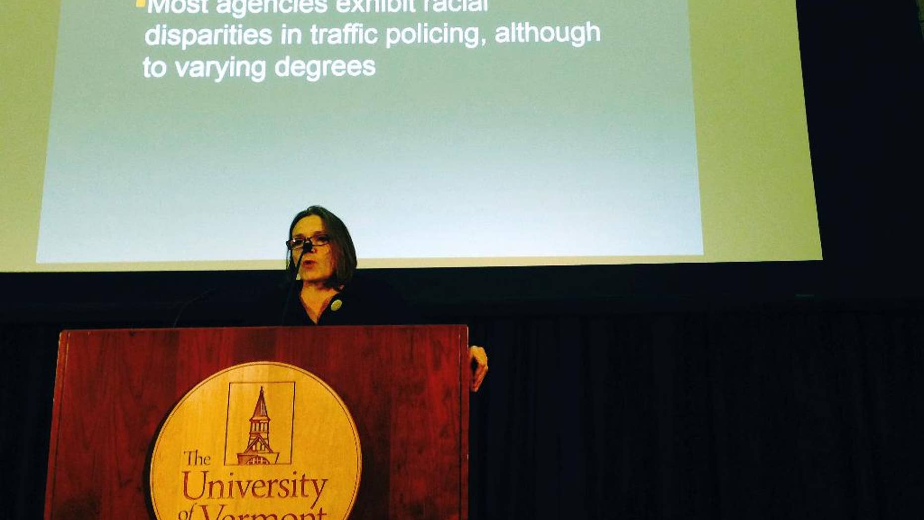 University of Vermont professor Stephanie Seguino addresses an audience Monday, Jan. 9, 2017, in Burlington, Vt., while discussing the findings of a study that has found racial disparities in how police treat drivers in the state. The study looked at 2015 traffic stop data from 29 police departments around Vermont. Among the findings, black drivers were four times more likely than whites to be searched after traffic stops, and Hispanic drivers were nearly three times more likely. (AP Photo/Lisa Rathke)