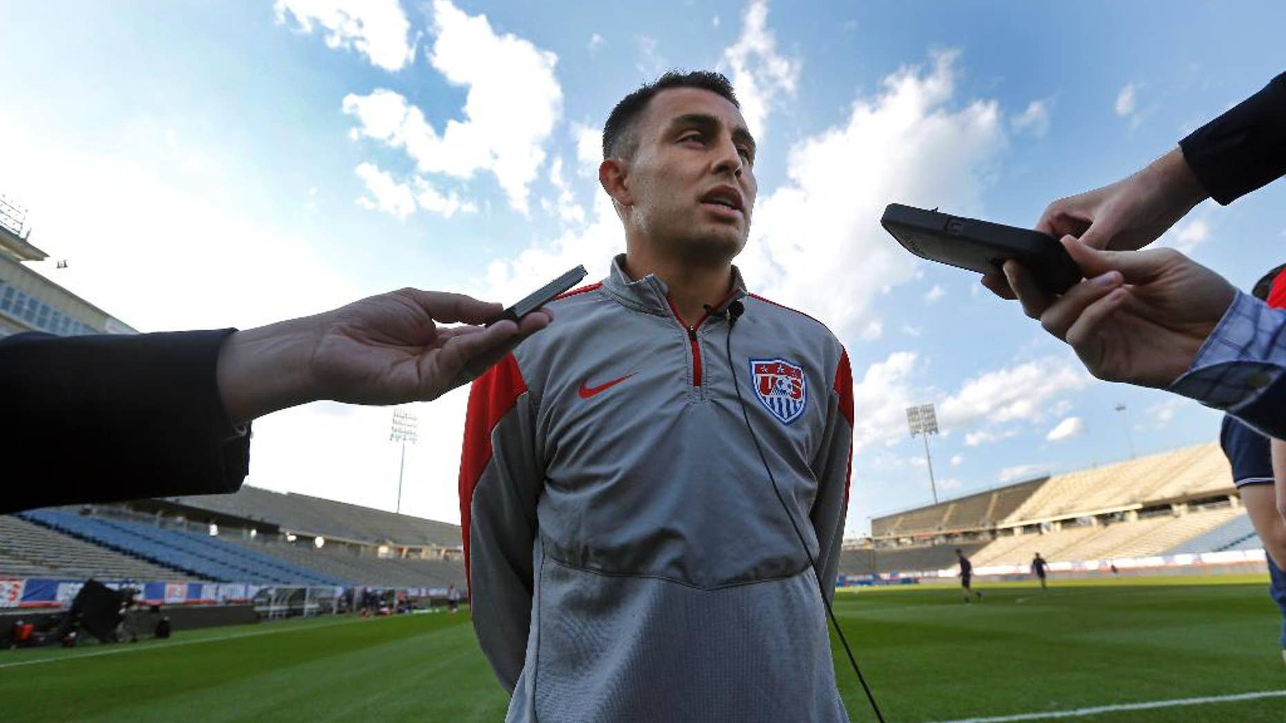 United States forward Miguel Ibarra speaks to reporters prior to training at Rentschler Field in East Hartford, Conn., Thursday, Oct. 9, 2014. The U.S. will host Ecuador in a friendly soccer match on Friday. (AP Photo/Elise Amendola)