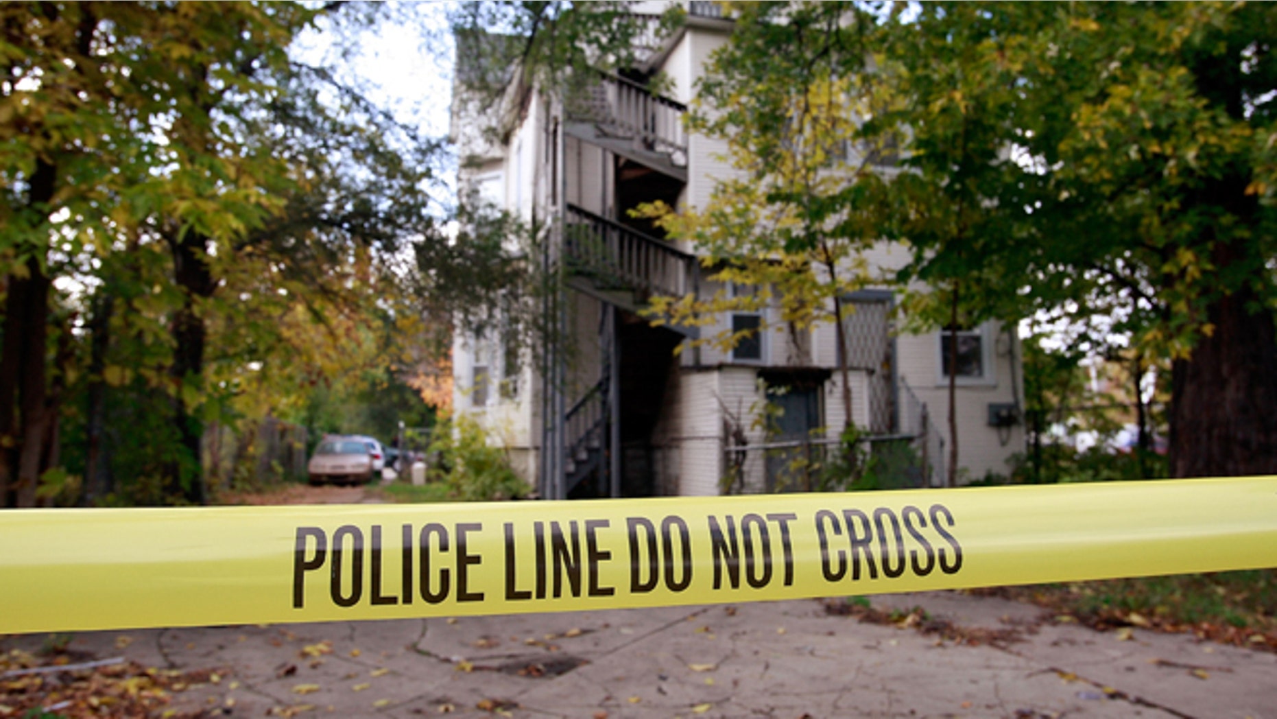 CHICAGO - OCTOBER 25: Police Tape is streched around the outside of the home of 57-year-old Darnell Hudson Donnerson, the mother of Oscar winner Jennifer Hudson, October 25, 2008 in Chicago, Illinois. Donnerson was found shot to death in her living room yesterday and her son Jason was found shot to death in a bedroom of the home. Police are searching for Donnerson's seven-year-old grandchild who is missing from the home. (Photo by Scott Olson/Getty Images)