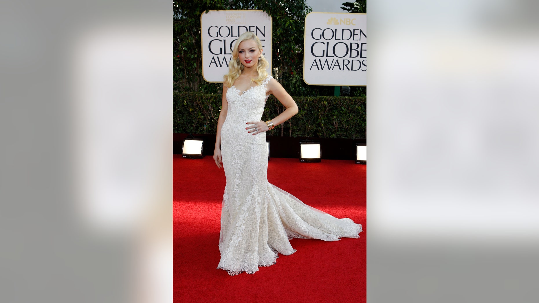 Francesca Eastwood, Miss Golden Globe 2013, poses as she arrives at the 70th annual Golden Globe Awards in Beverly Hills, California, January 13, 2013.