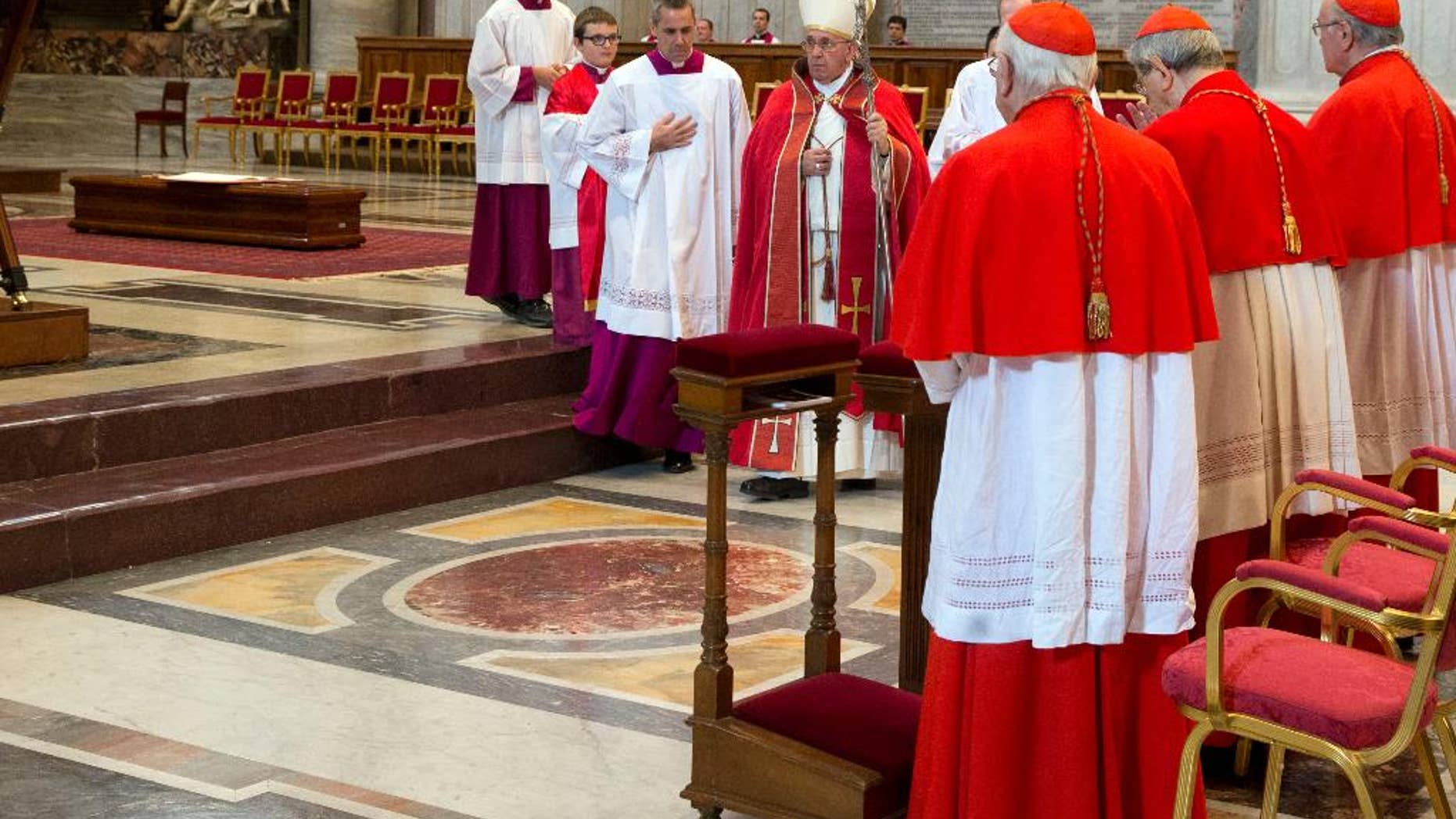 Dec. 11, 2014: Pope Francis leaves at the end of a funeral mass for late Argentine Cardinal Jorge Maria Mejia, in St. Peter's Basilica, at the Vatican.