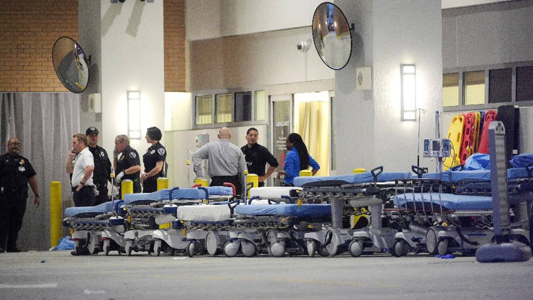 FILE - In this June 12, 2016, file photo,emergency personnel wait with stretchers at the emergency entrance to Orlando Regional Medical Center hospital for the arrival of patients from the scene of a fatal shooting at Pulse Orlando nightclub in Orlando, Fla. Radical Islamic militancy that has sustained itself for decades overseas has inspired a series of attacks on U.S. soil in the last year and a half. The culprits typically have no ties to foreign terrorist organizations, no explicit directions from overseas and no formal training, unlike the operatives of 9/11. Instead, they’ve blended into American society and skated beneath the radar of federal investigators grappling with a frenetic threat landscape and hundreds of investigations across the country. (AP Photo/Phelan M. Ebenhack, file)