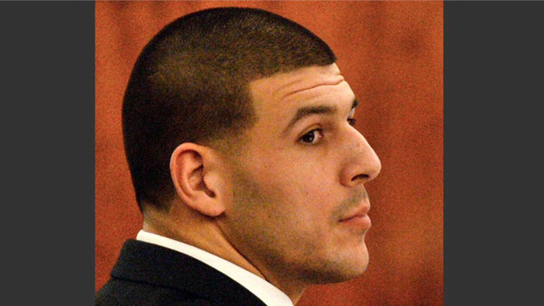 Jan. 30, 2015: Former New England Patriots football player Aaron Hernandez listens to testimony during his murder trial in Fall River, Mass.