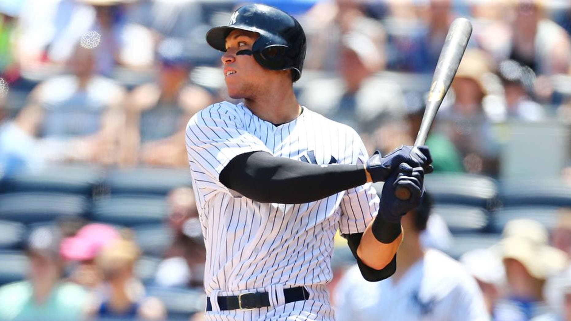 NEW YORK, NY - JUNE 11: Aaron Judge #99 of the New York Yankees singles to right field in the first inning against the Baltimore Orioles at Yankee Stadium on June 11, 2017 in the Bronx borough of New York City. (Photo by Mike Stobe/Getty Images)