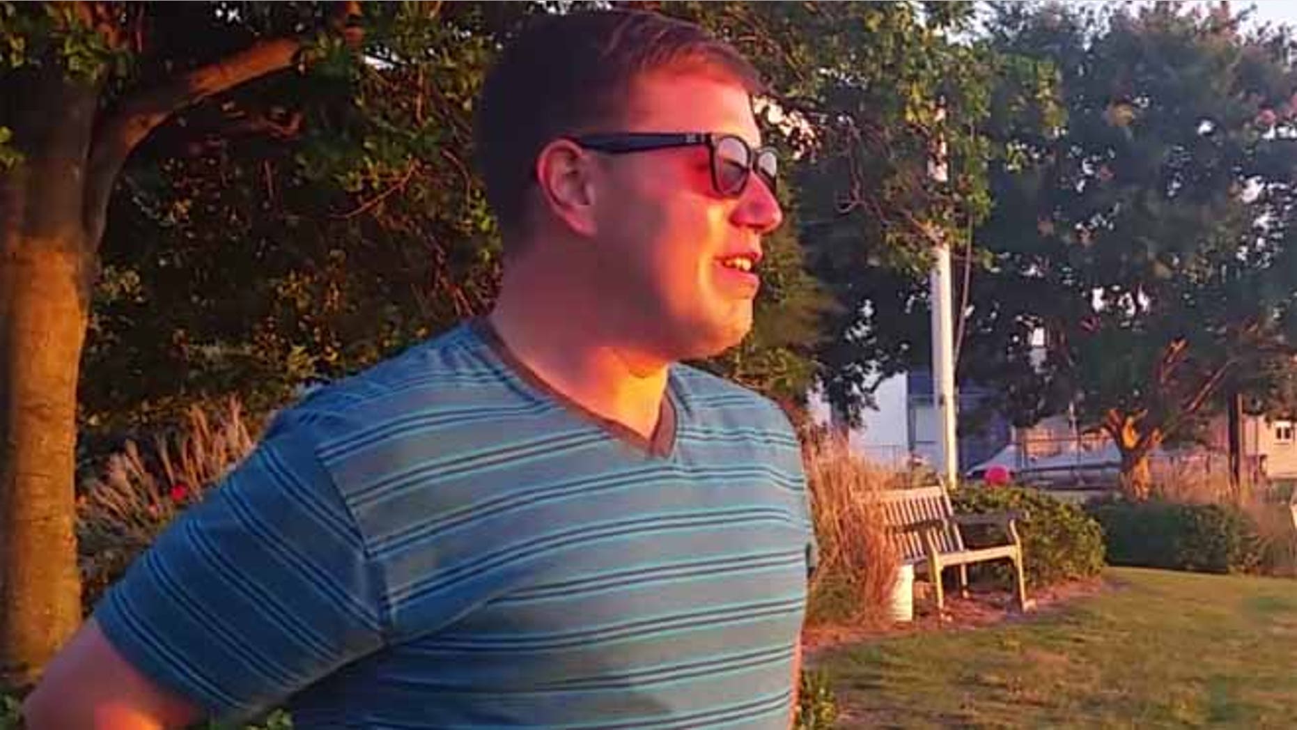 Aaron Williams-Mele is pictured seeing the sunset in color for the first time.