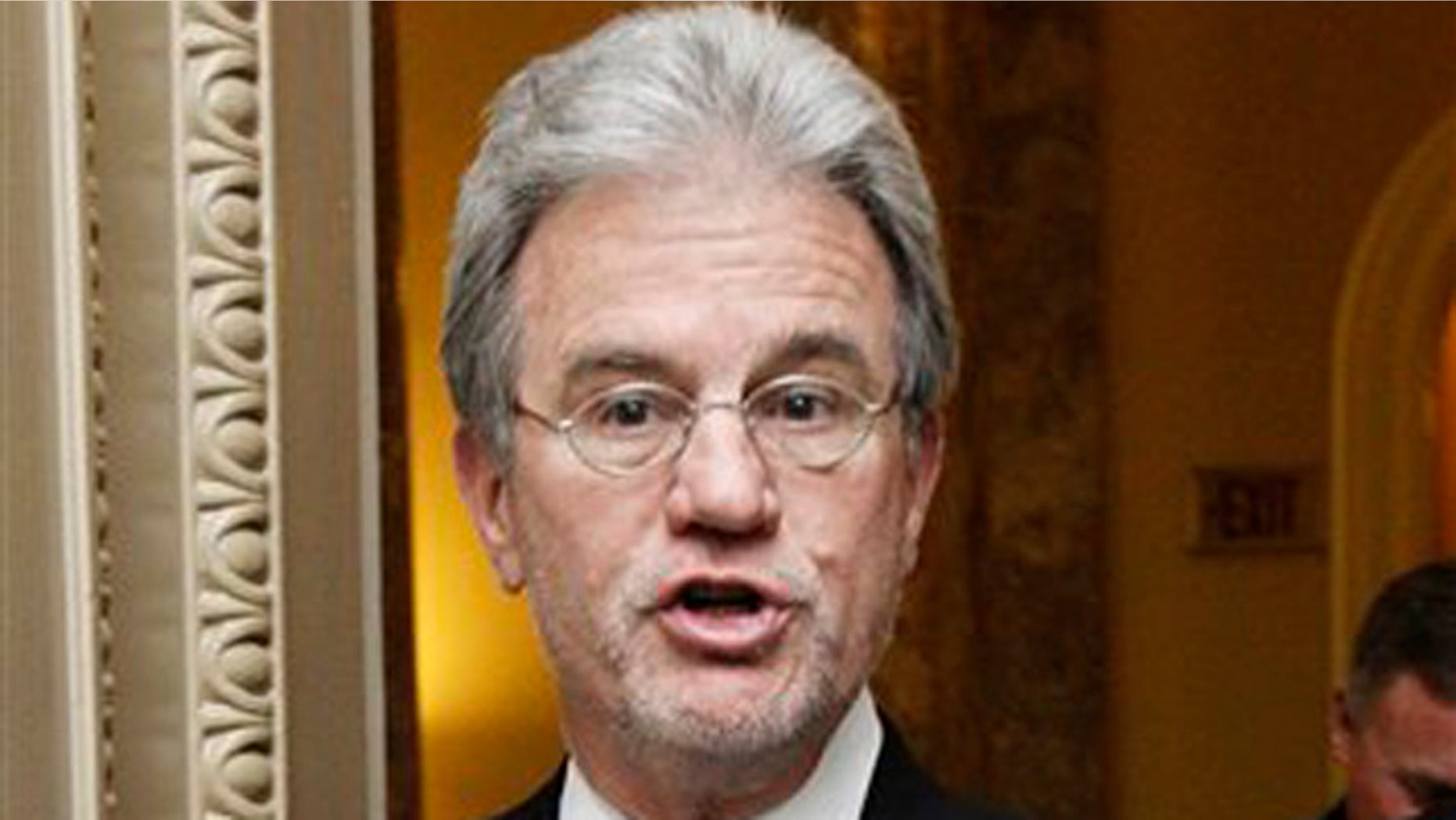 FILE: Nov. 29, 2011: Sen. Tom Coburn speaks to reporters on Capitol Hill, in Washington, D.C.